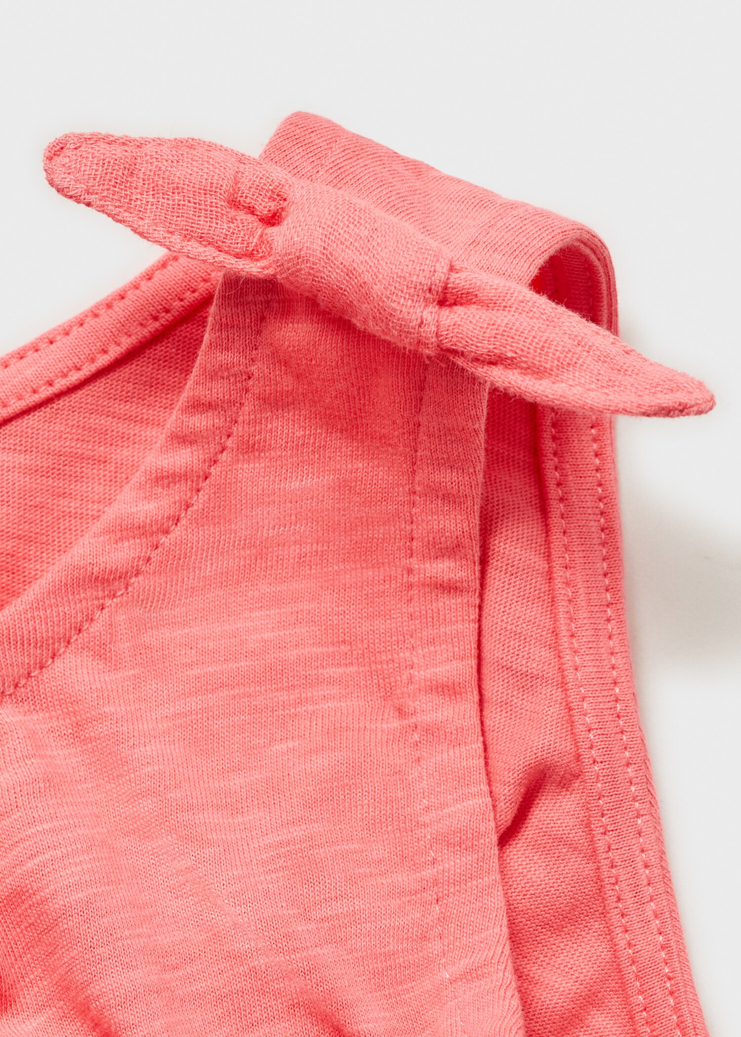 Short jumpsuit with bow detail - Details of the article 0