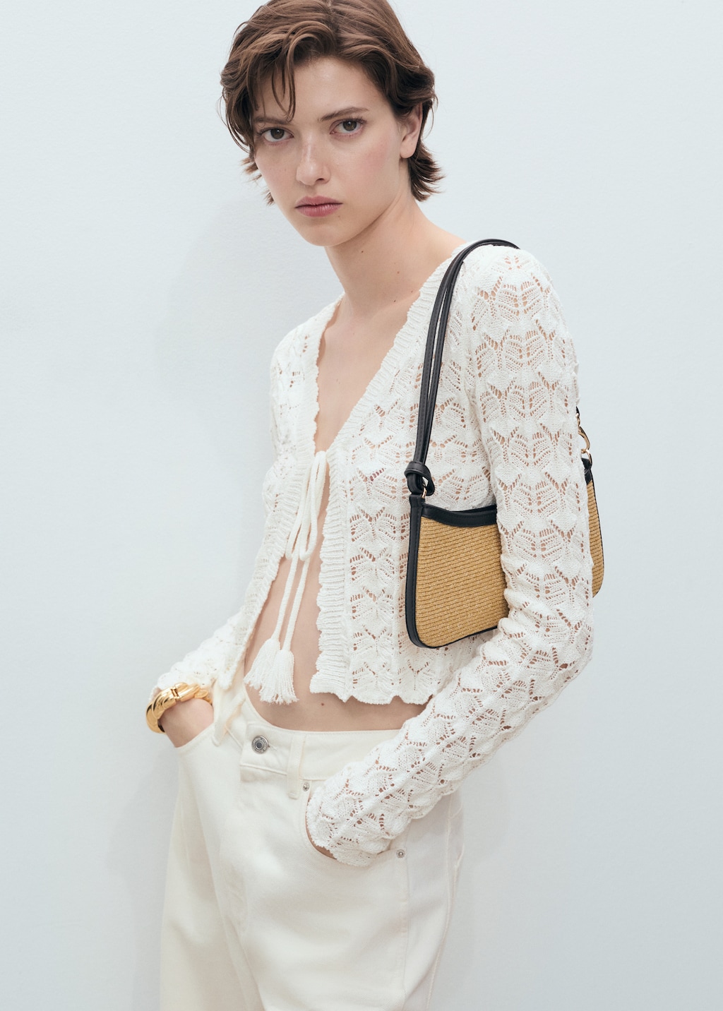 Crochet cardigan with bow closure