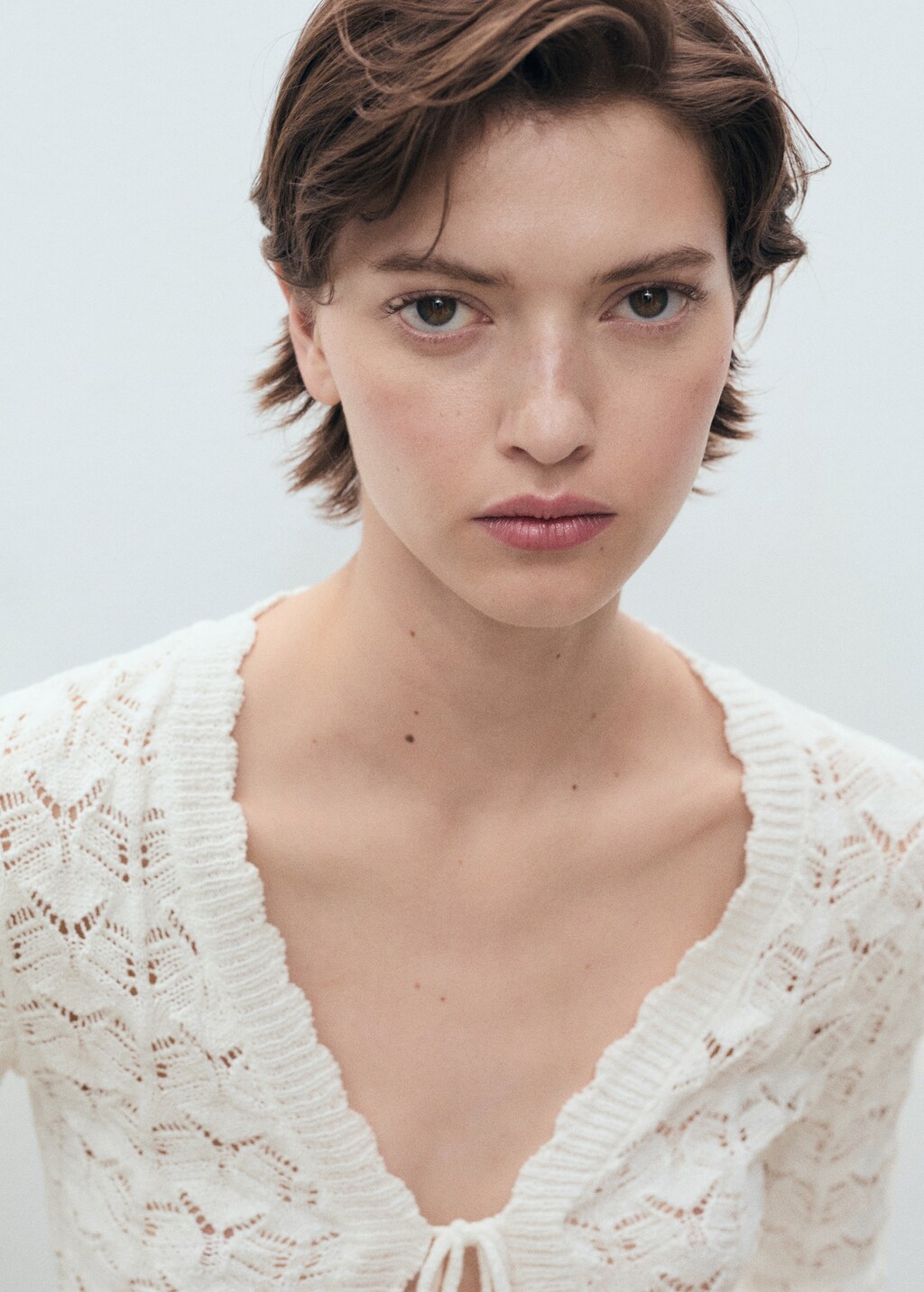 Crochet cardigan with bow closure