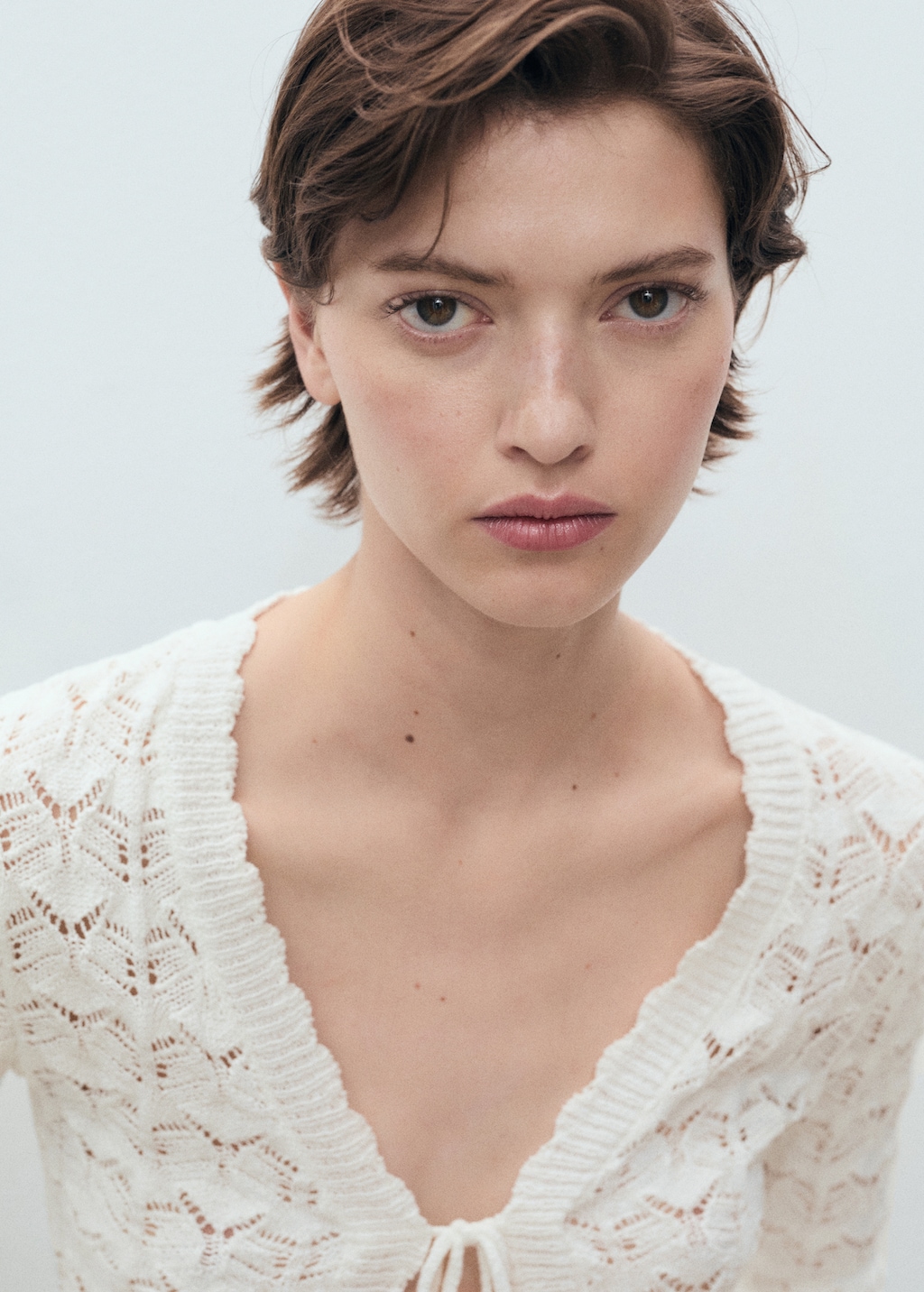 Crochet cardigan with bow closure