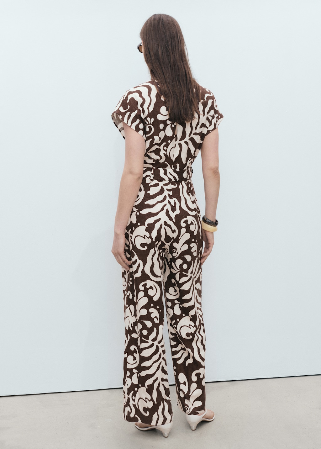 Printed linen jumpsuit with belt - Women | MANGO USA