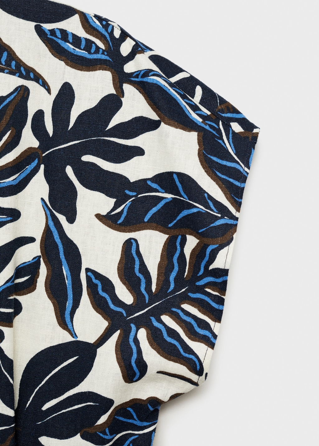 Printed linen jumpsuit with belt