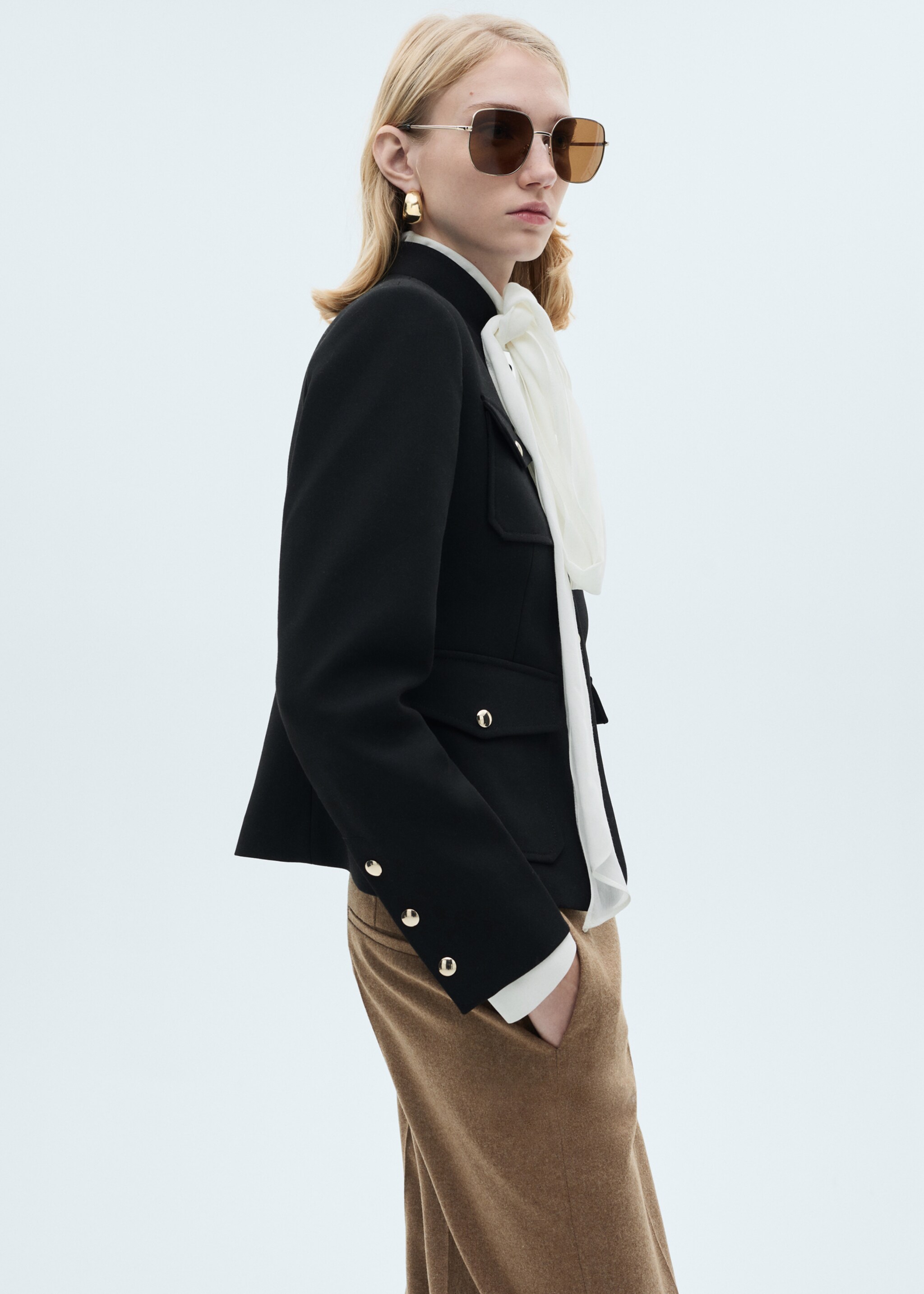 Jacket pockets with button detail - Details of the article 2
