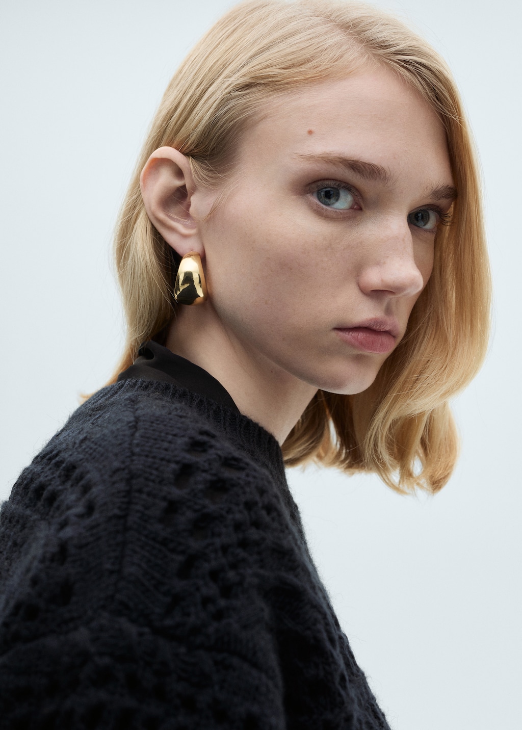 Knit sweater with lace pattern