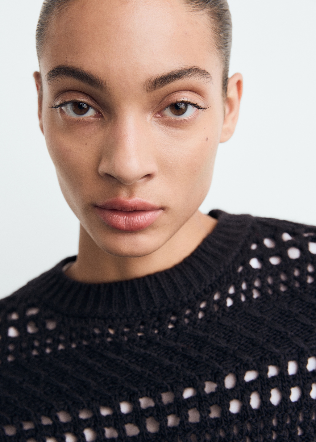 Knit sweater with lace pattern