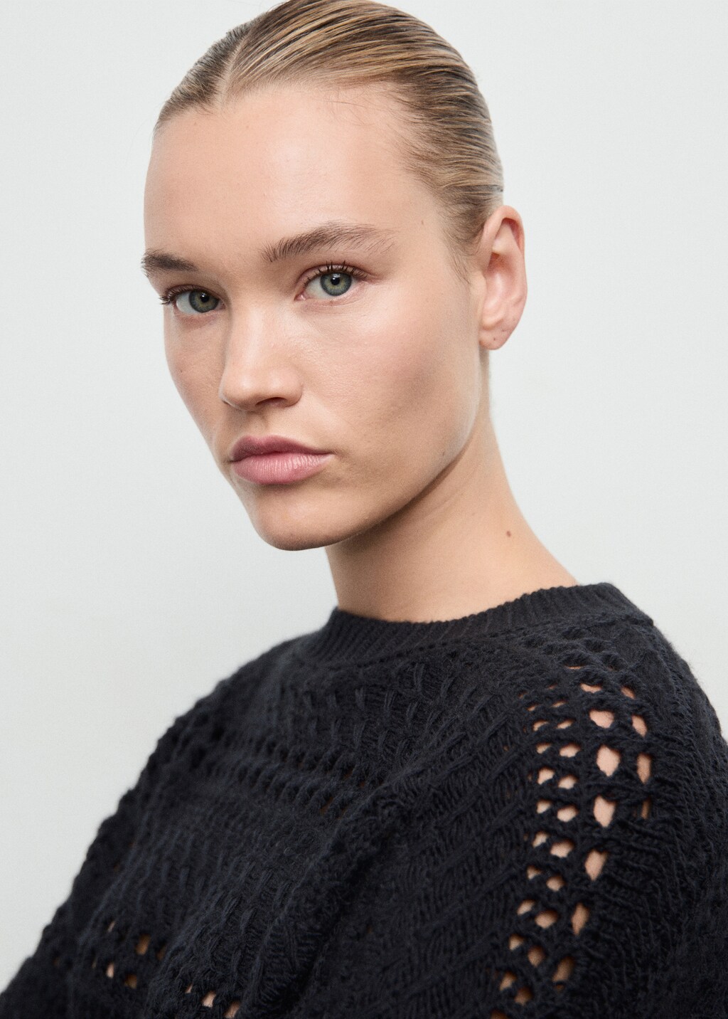 Knit sweater with lace pattern