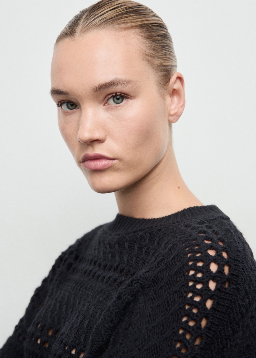 Knit sweater with lace pattern