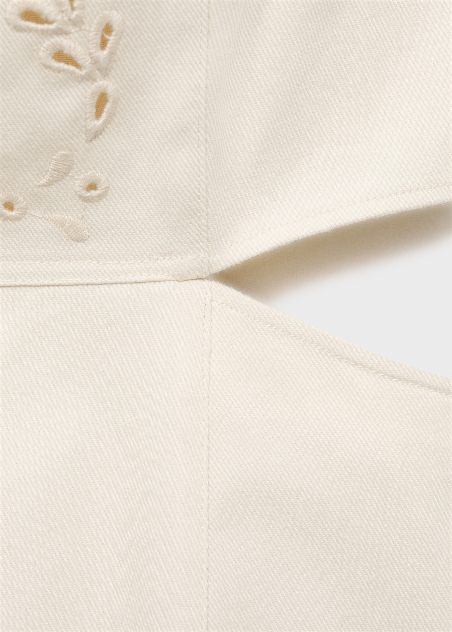 Dress with openwork details and openings - Details of the article 0