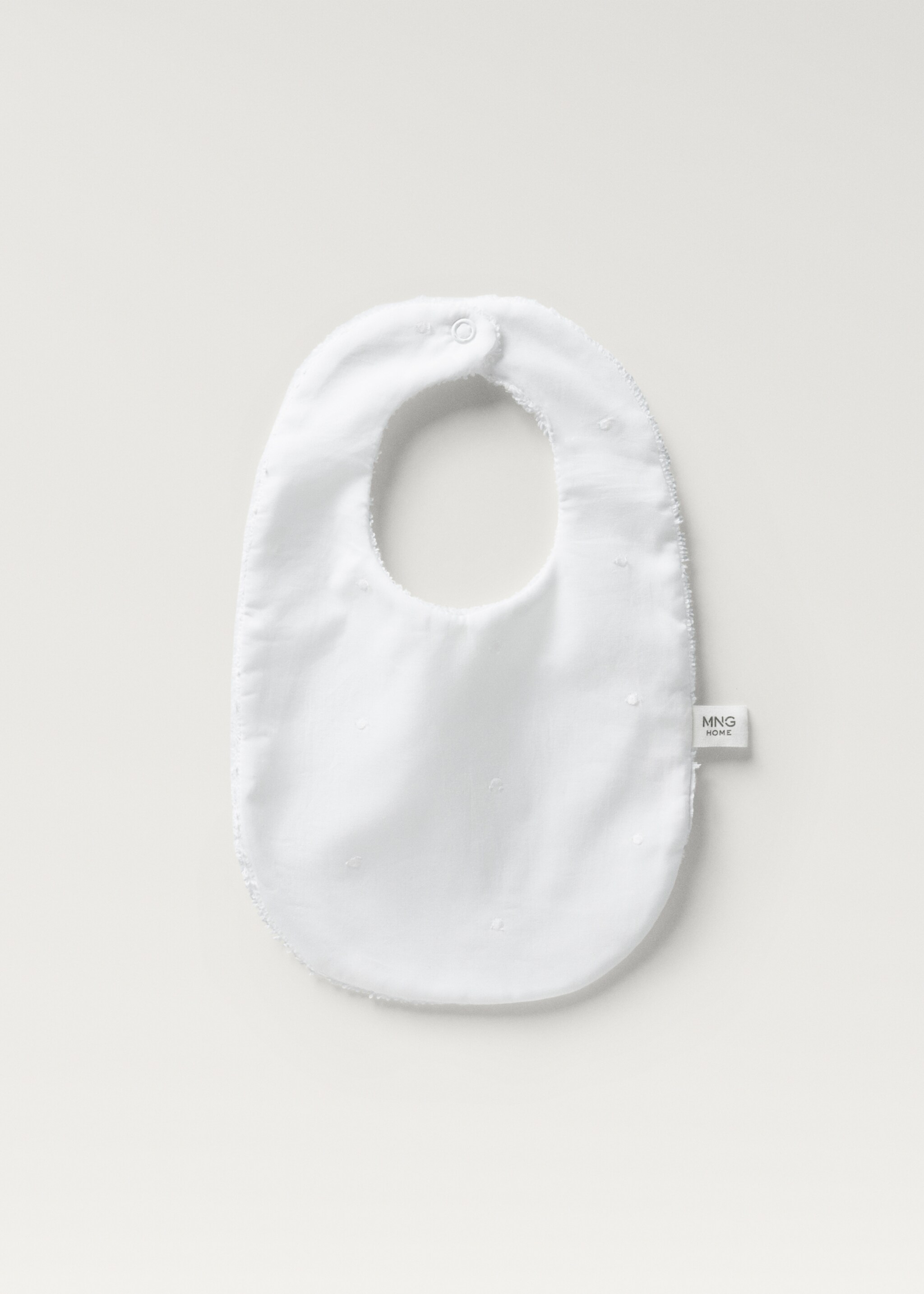 Terry cloth bib with embroidered details - Article without model