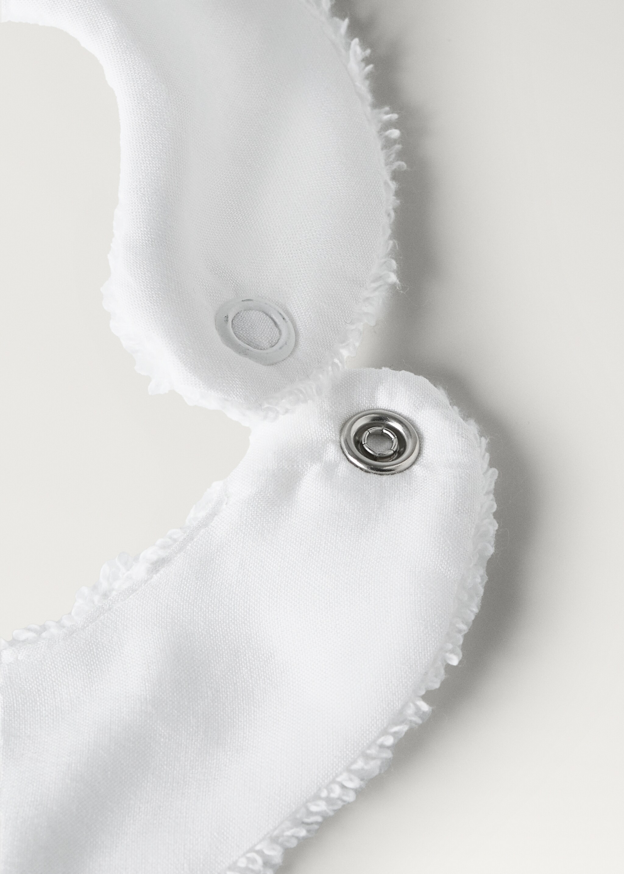 Terry cloth bib with embroidered details - Details of the article 2