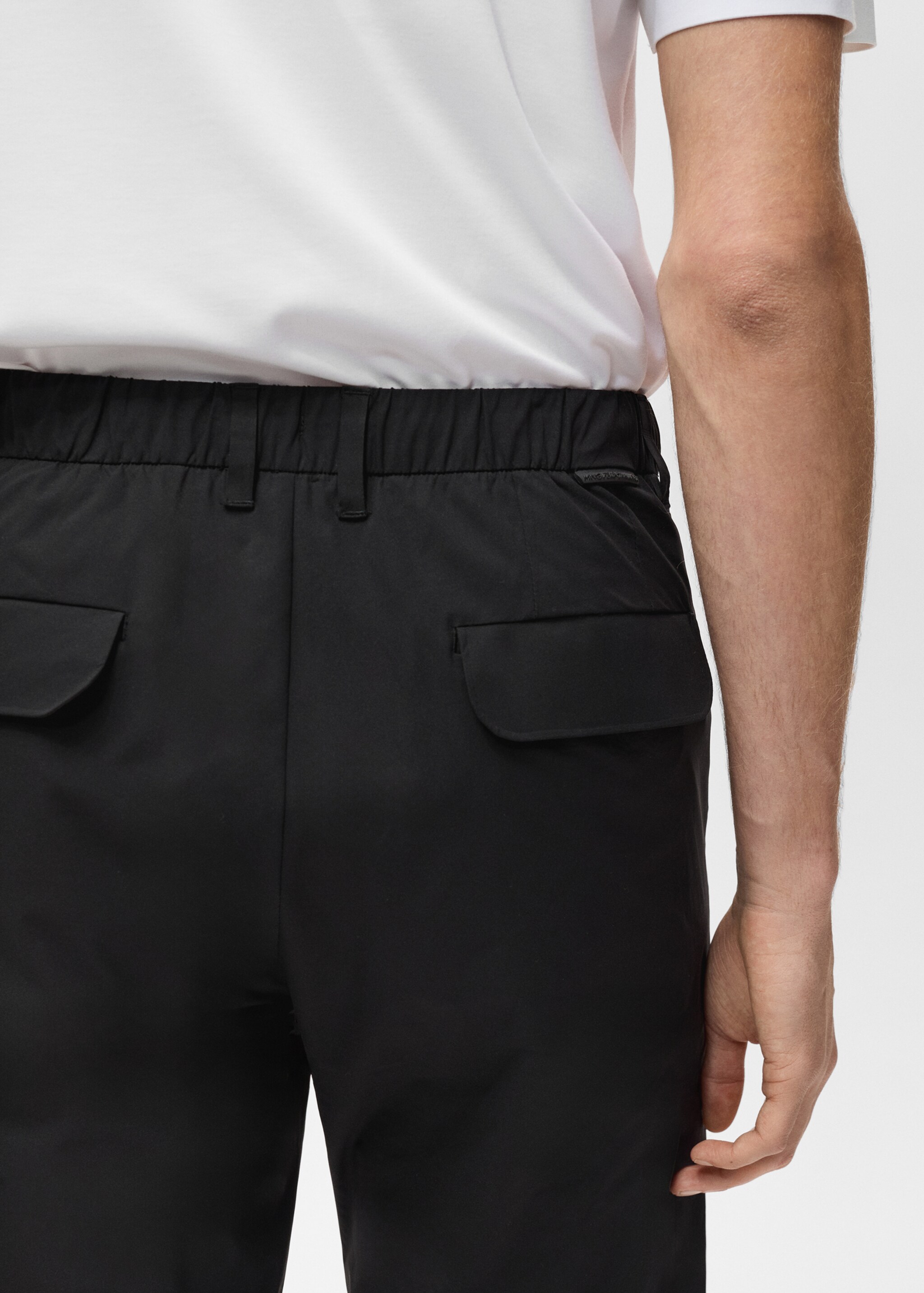Stretch fabric slim-fit trousers with drawstring - Details of the article 6