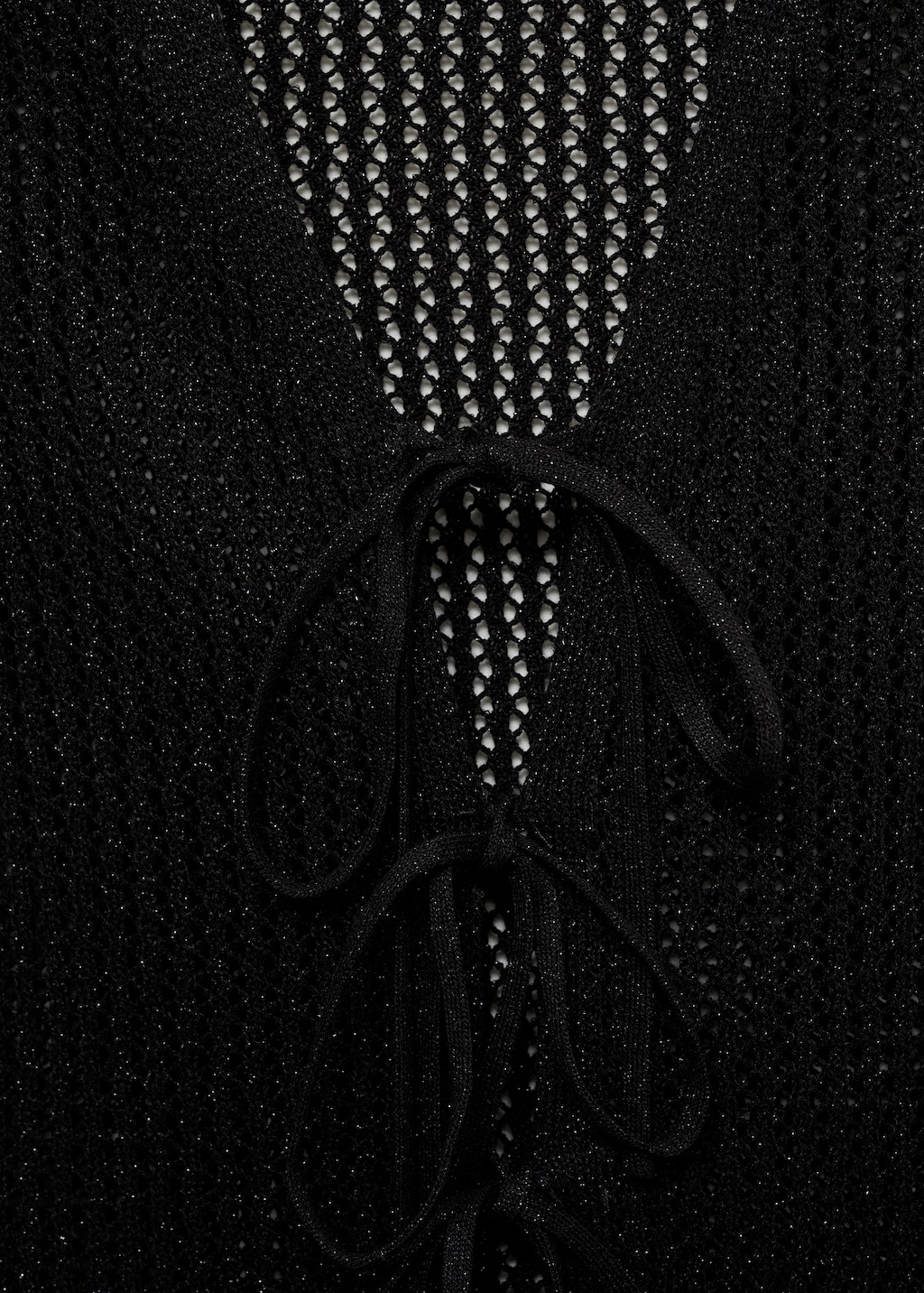 Knitted vest with lace pattern