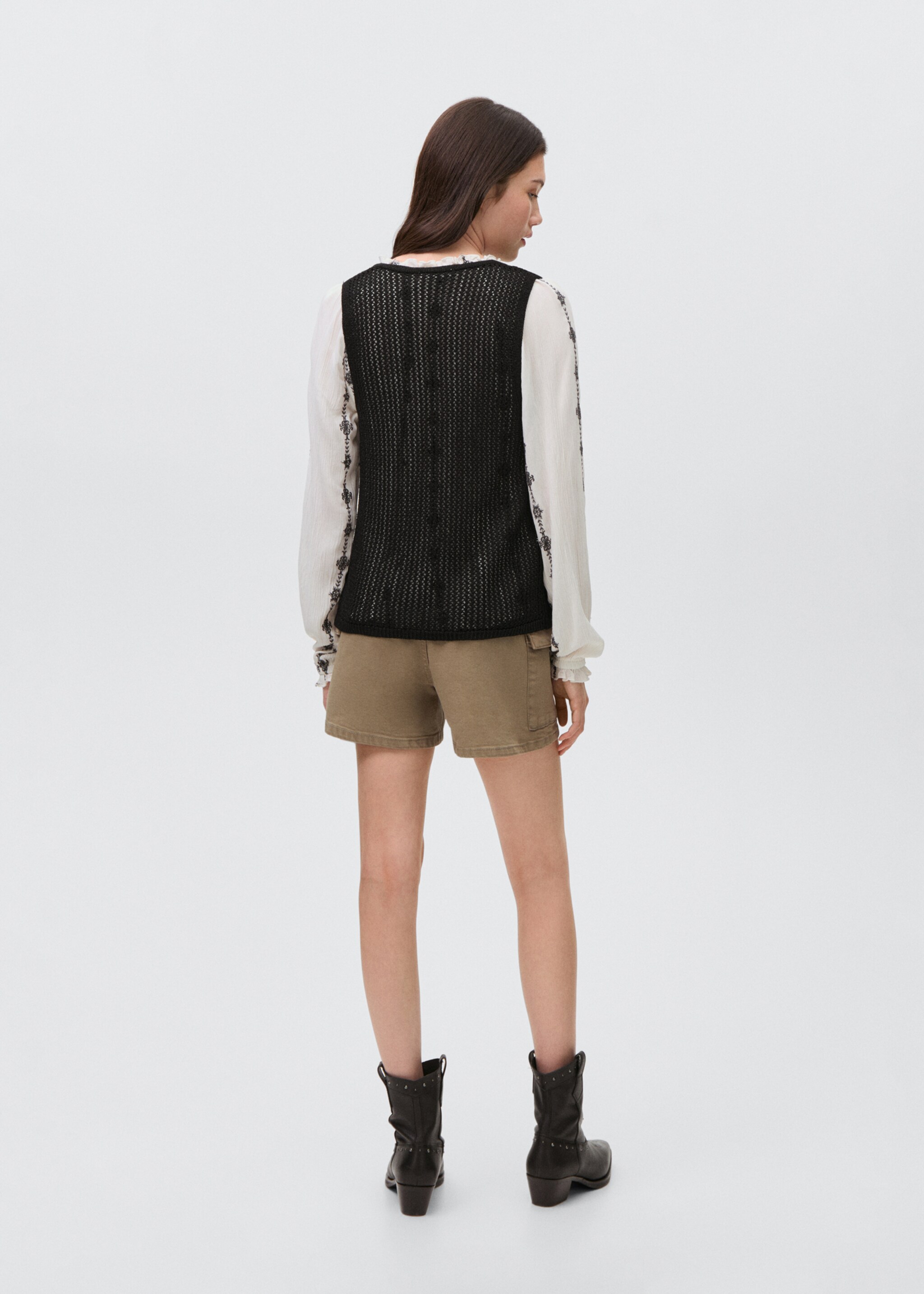 Openwork knitted waistcoat - Reverse of the article