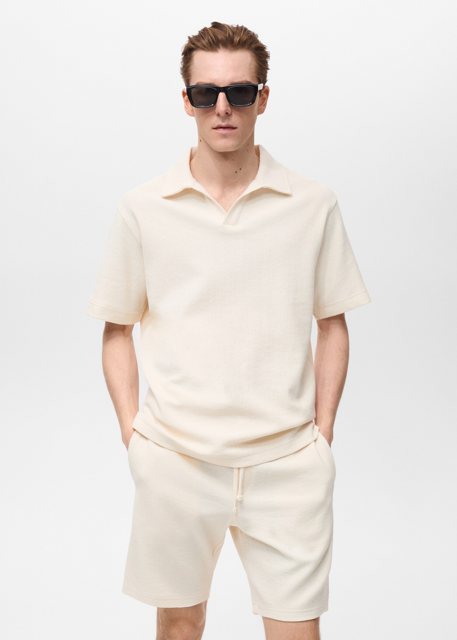 Polo textura regular fit - Plano medio