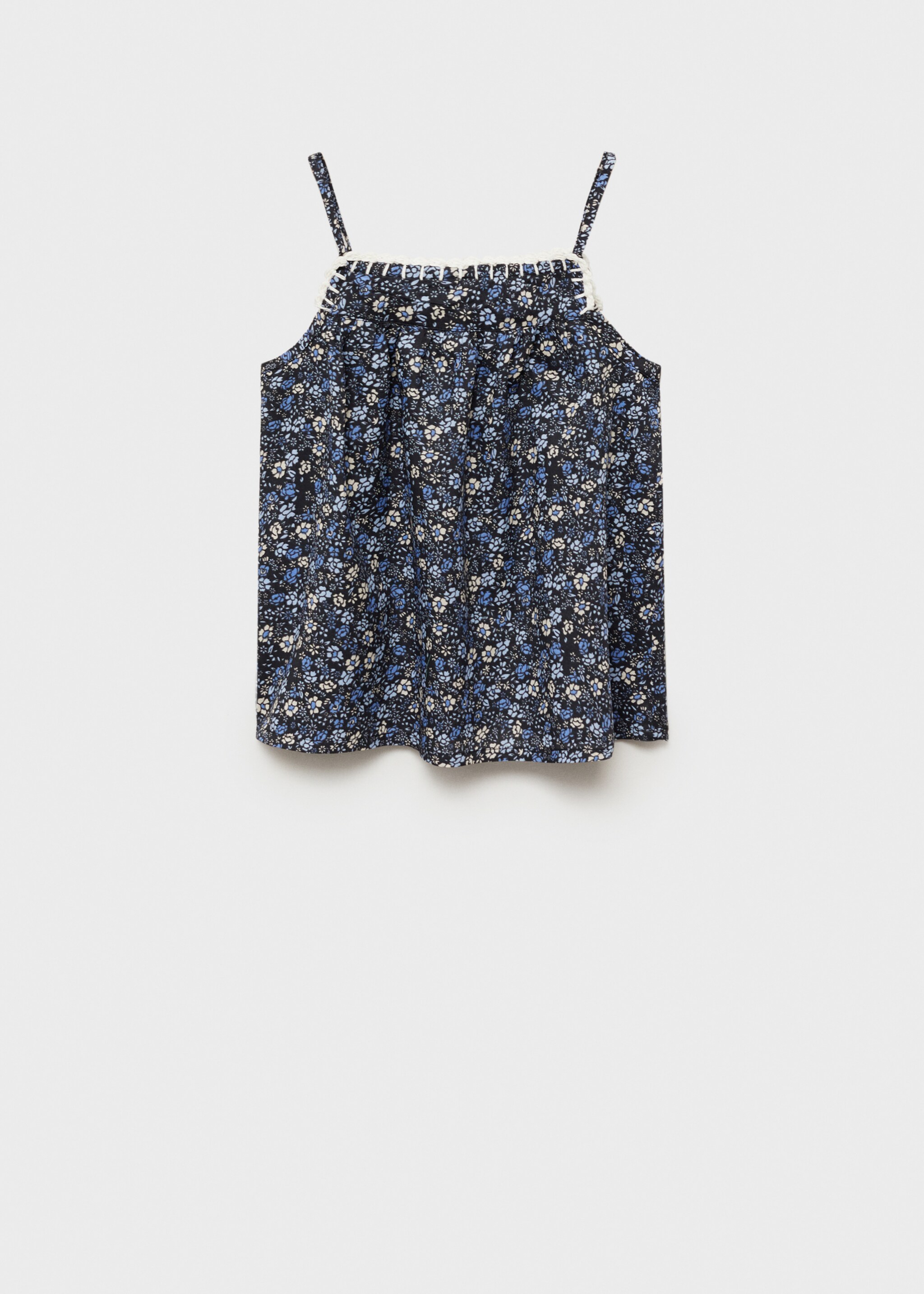 Blommig broderad blus - Artikelns baksida