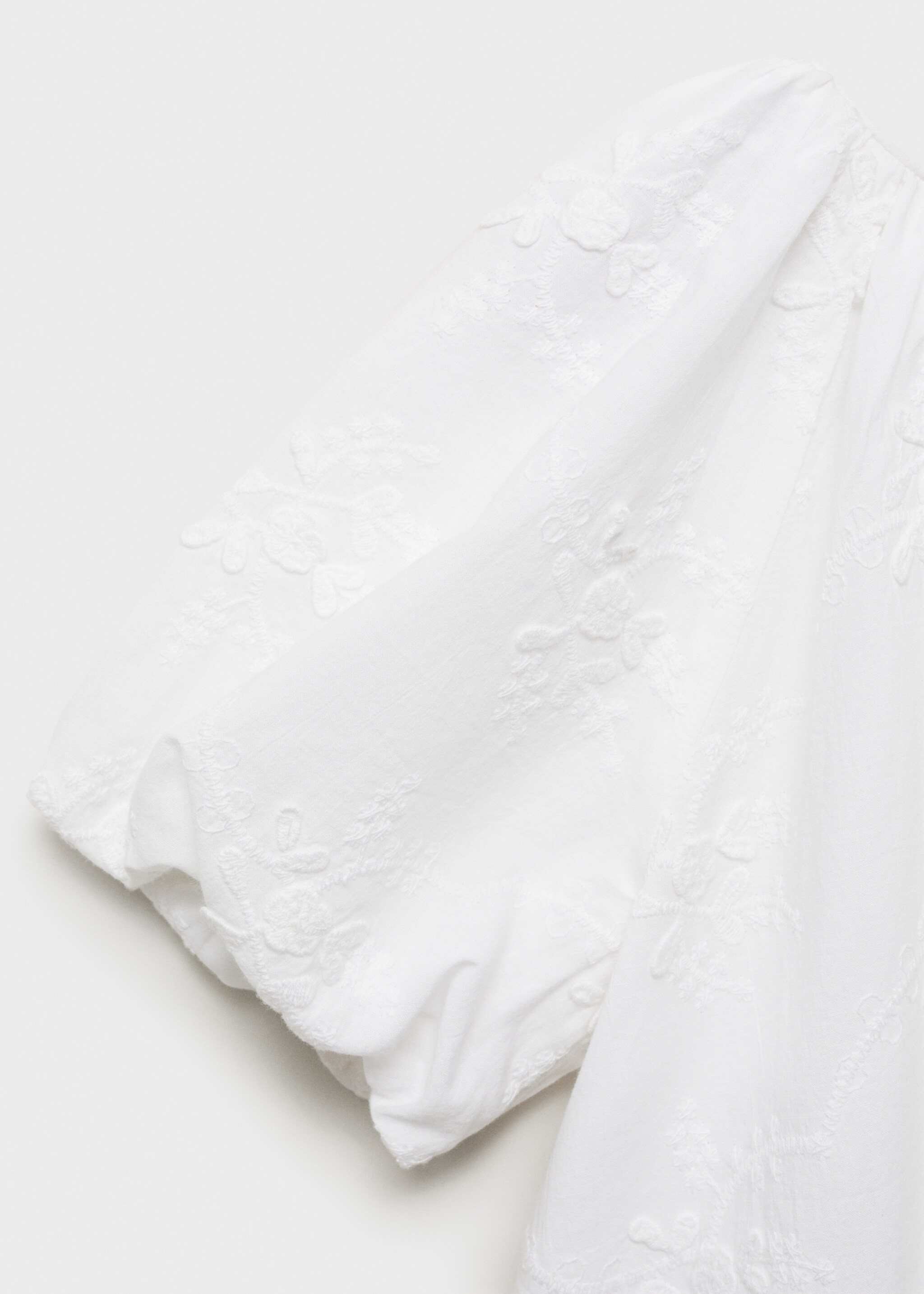 Kleid mit gestickten Details - Detail des Artikels 8