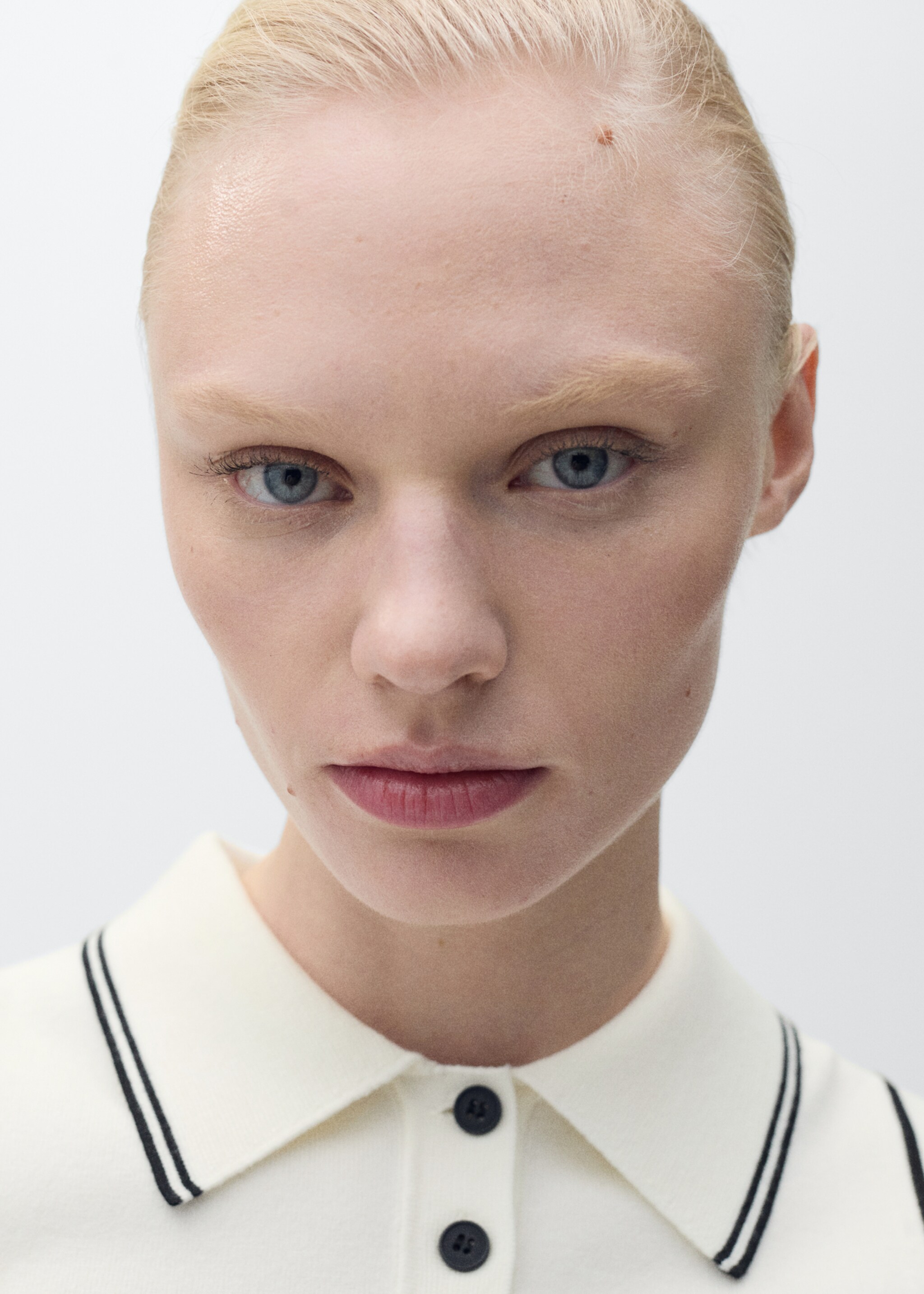 Polo-neck knitted top with contrasting trims - Details of the article 1
