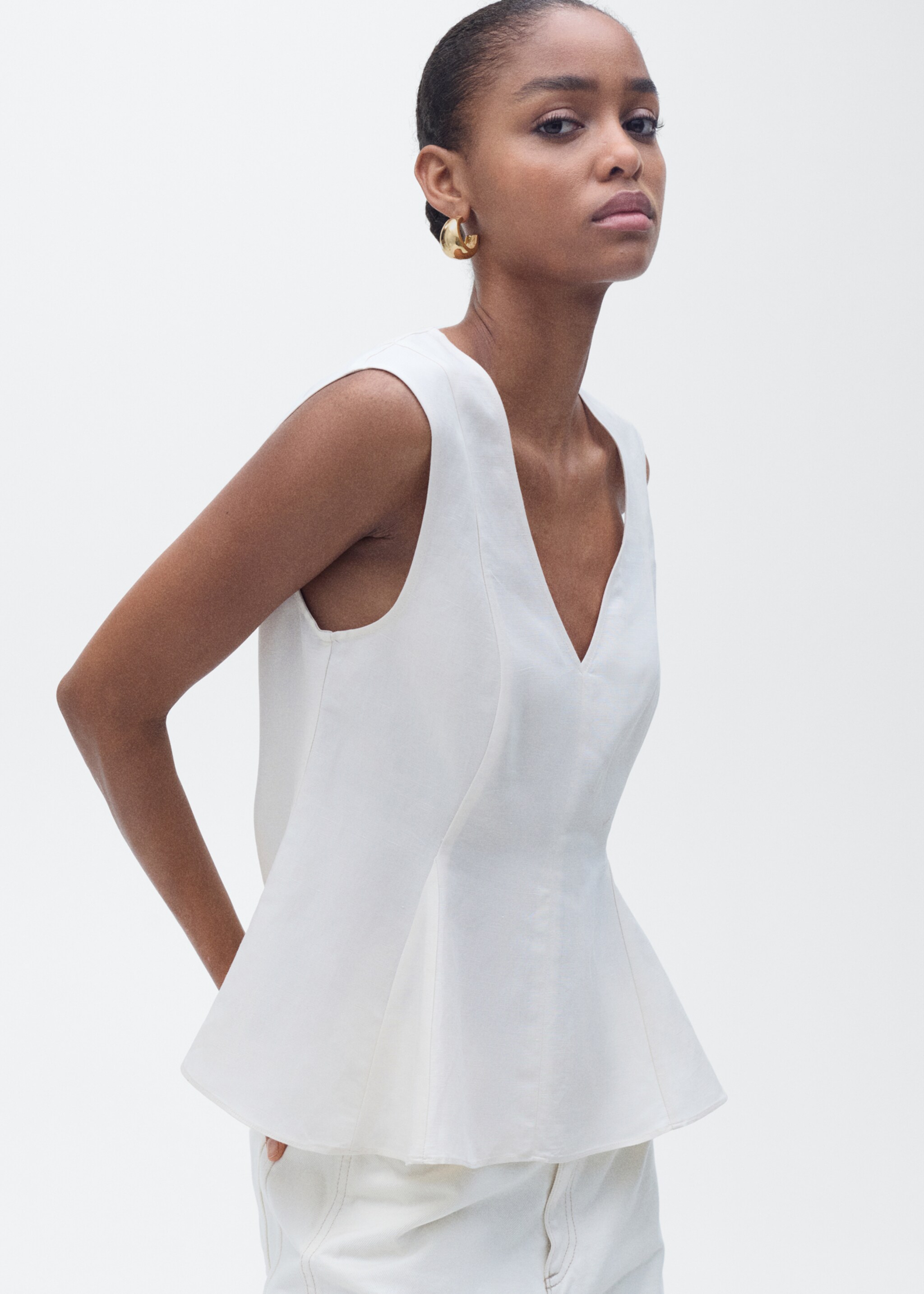 Linen-blend peplum top - Medium plane