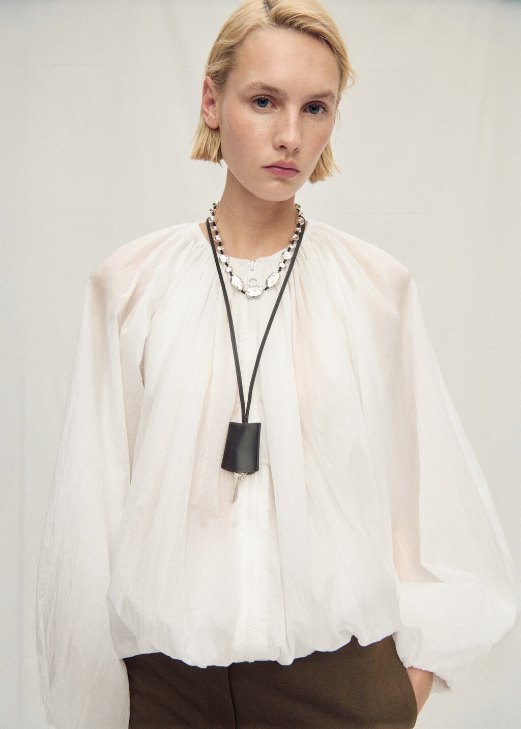 Gathered semi-transparent jacket