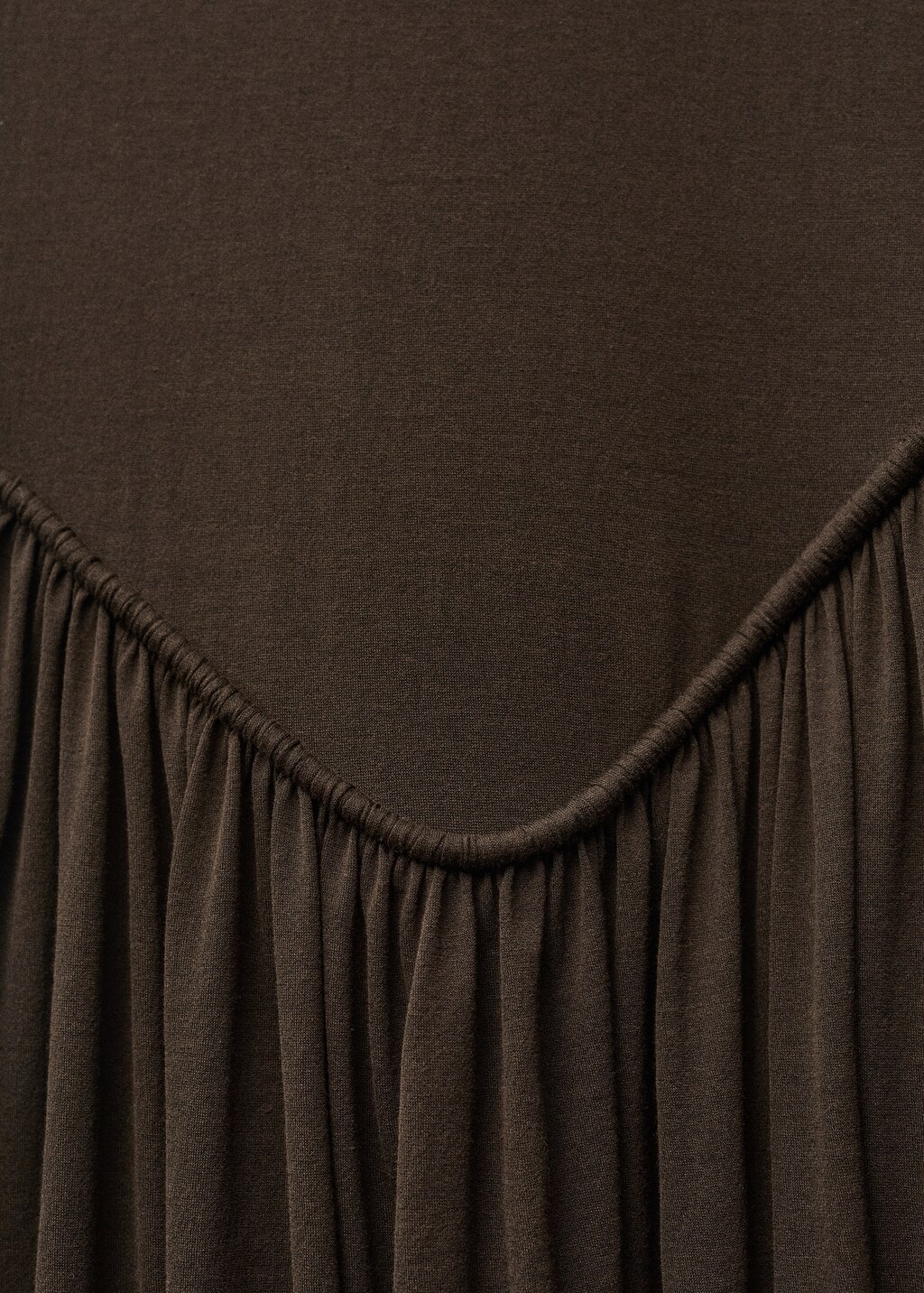 Semi-transparent dress with puffed hem