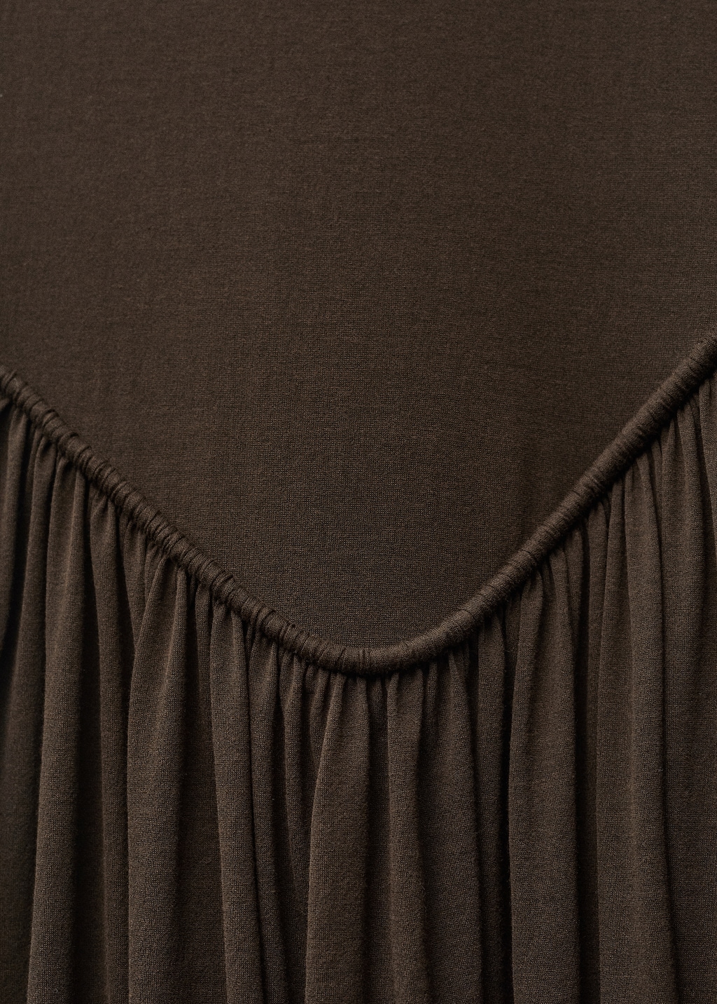 Semi-transparent dress with puffed hem