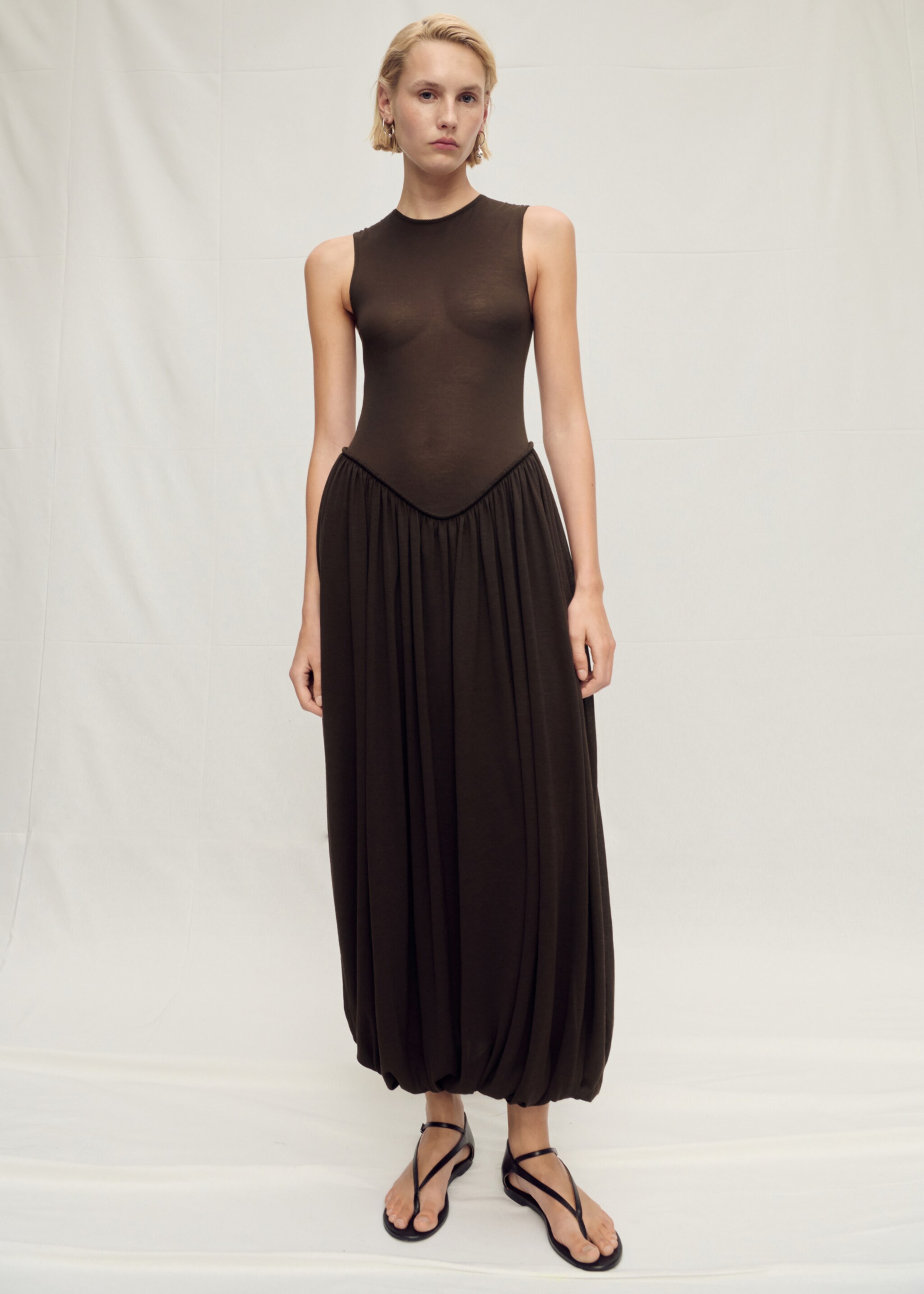 Semi-transparent dress with puffed hem - Details of the article 2