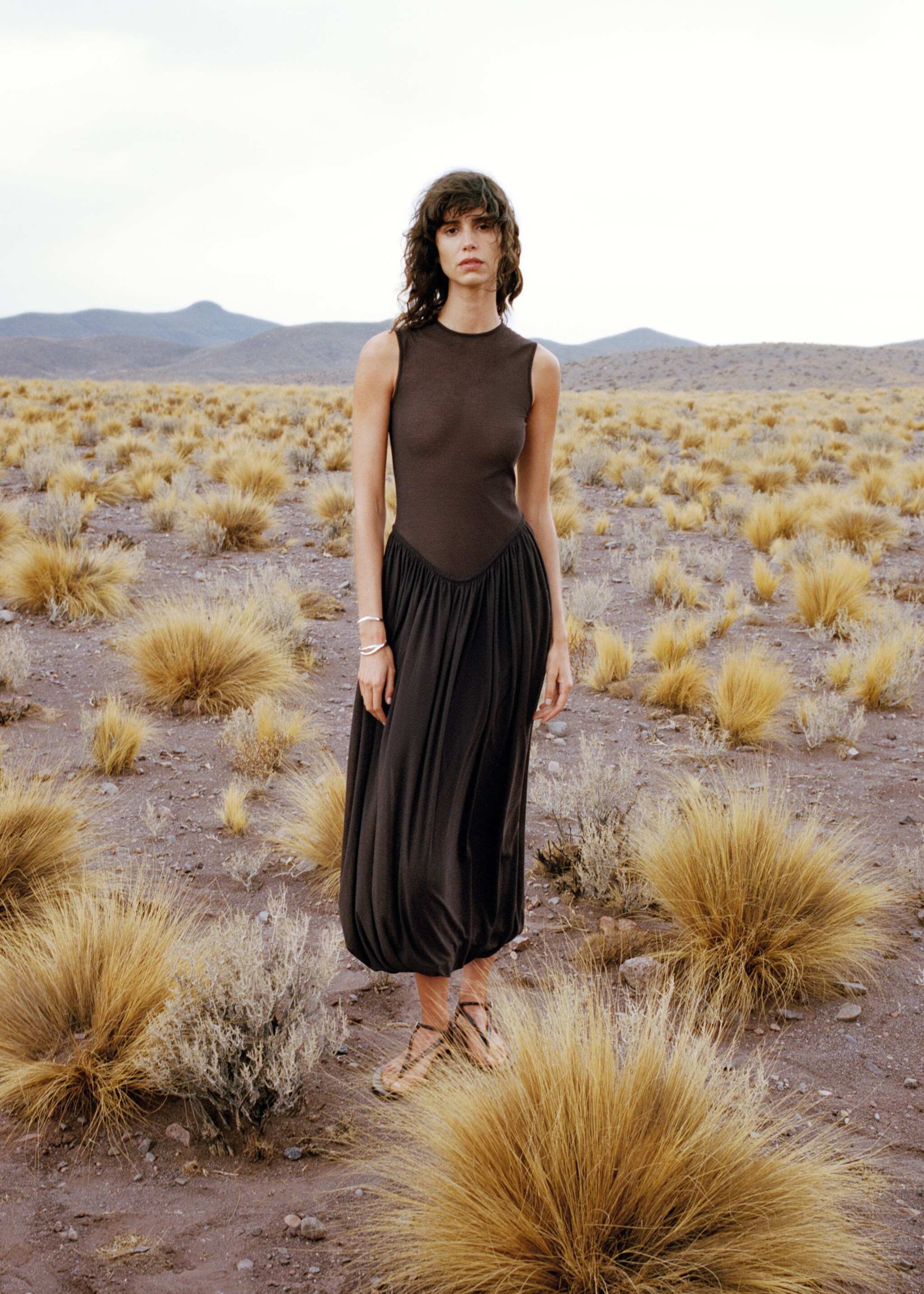 Semi-transparent dress with puffed hem - Details of the article 5