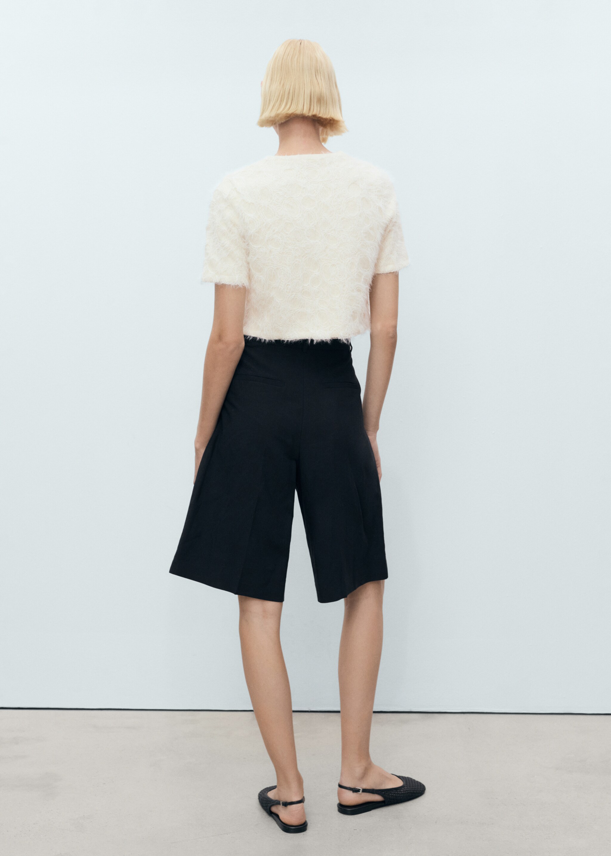 Knitted cropped cardigan - Reverse of the article