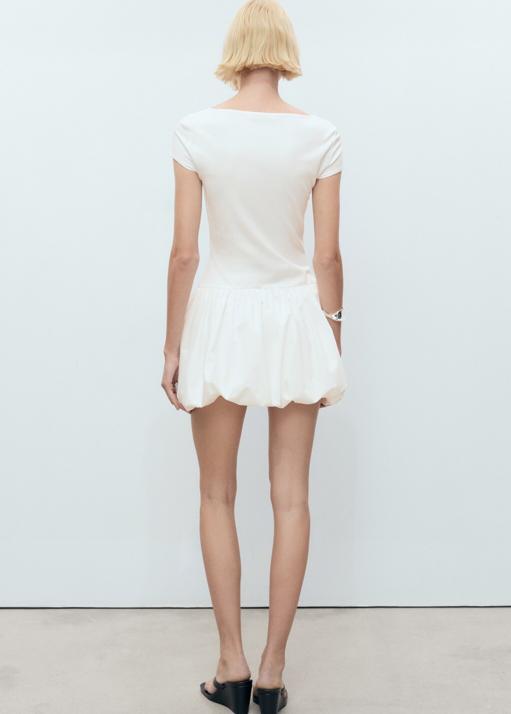 Combined dress with puffed hem