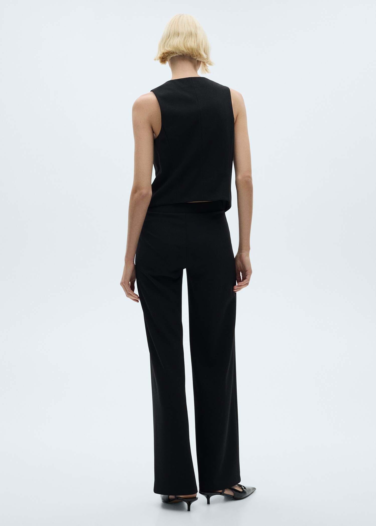 Straight knitted trousers - Reverse of the article