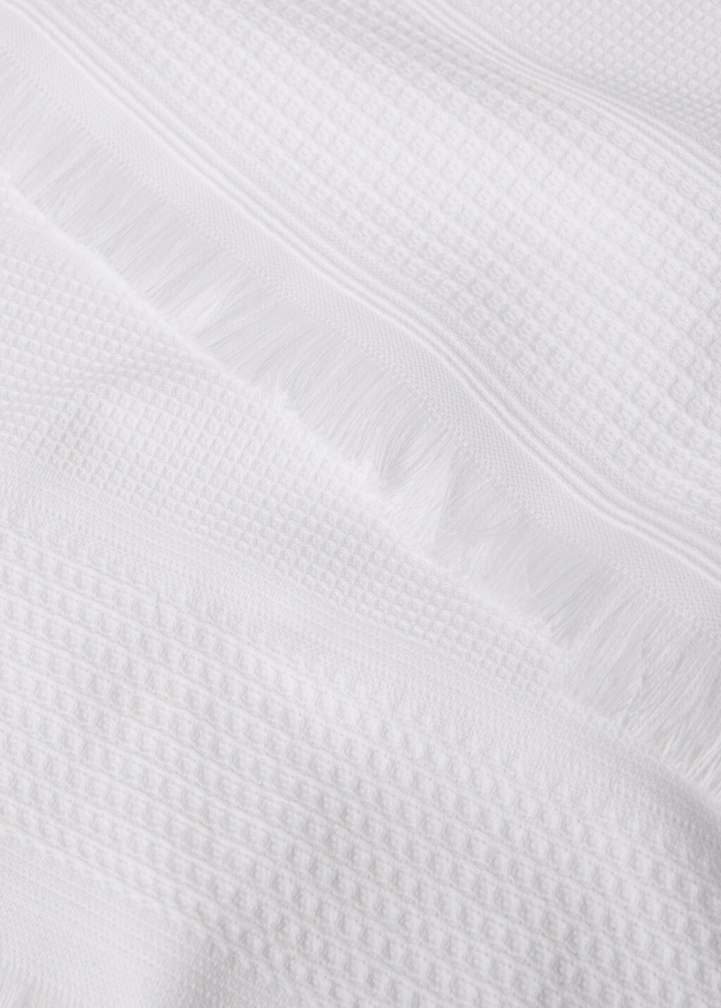 Textured cotton kitchen towel with fringes