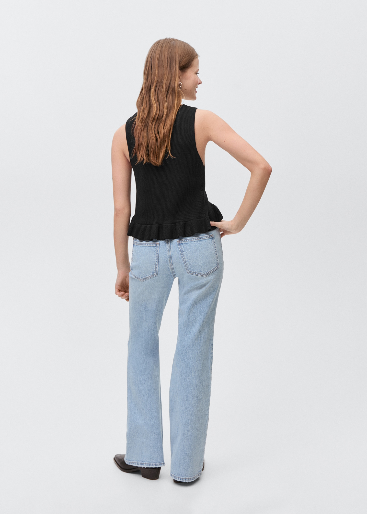 Flared jeans with decorative rips - Reverse of the article