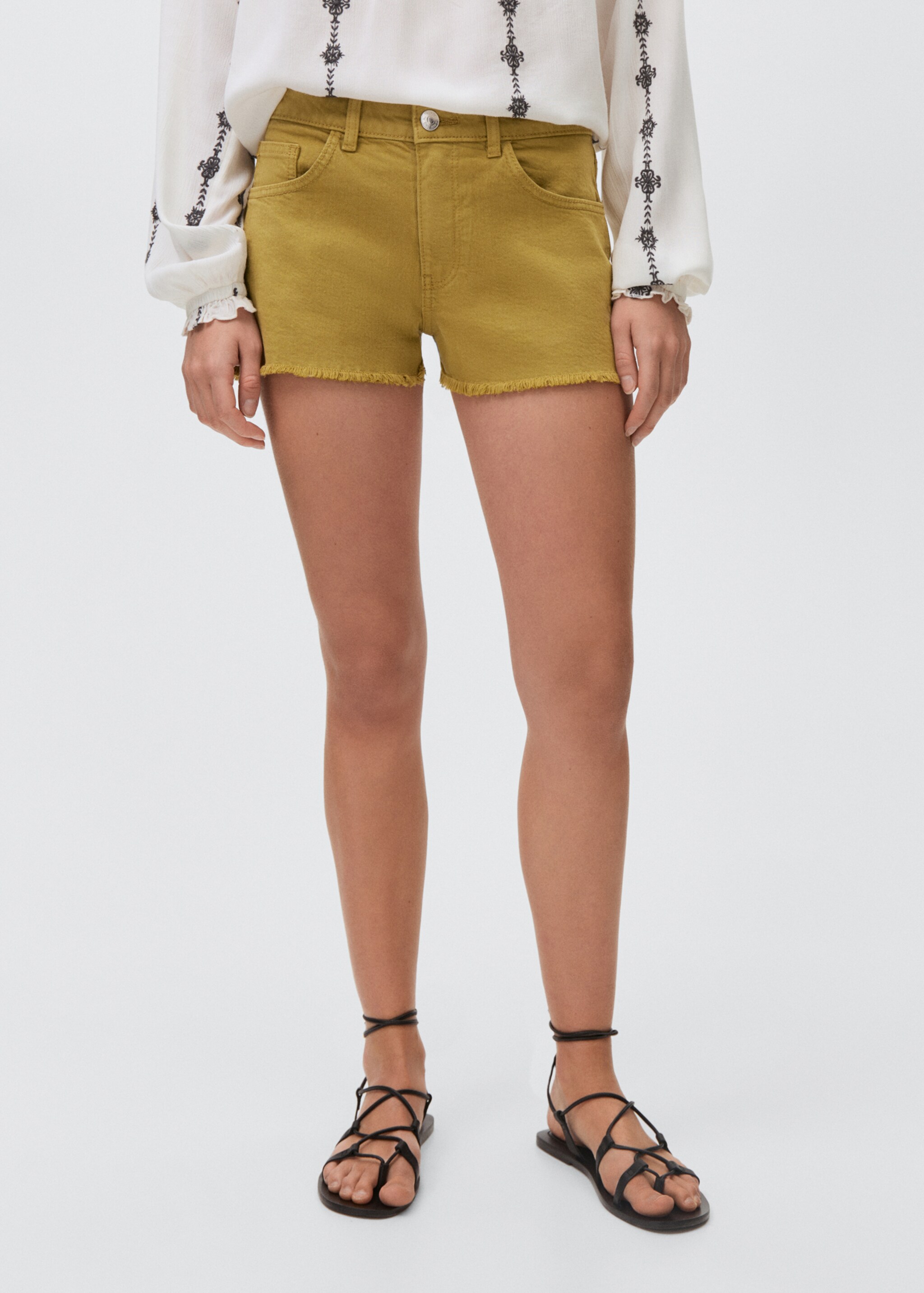 Denim shorts with frayed hem - Medium plane