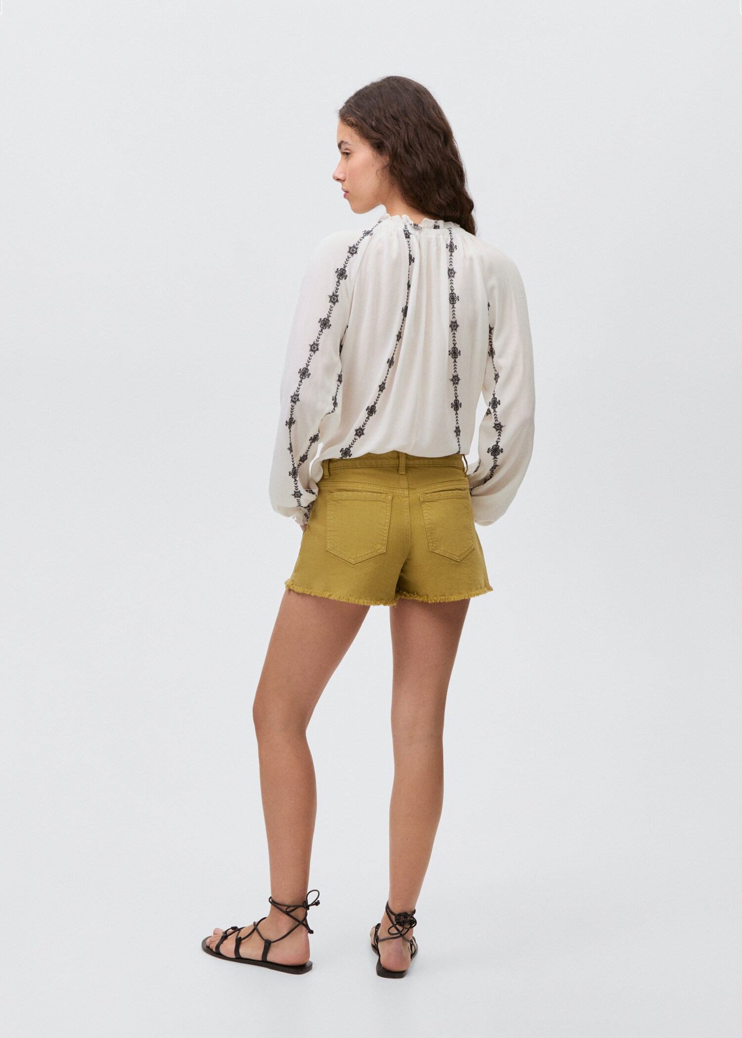 Denim shorts with frayed hem - Reverse of the article