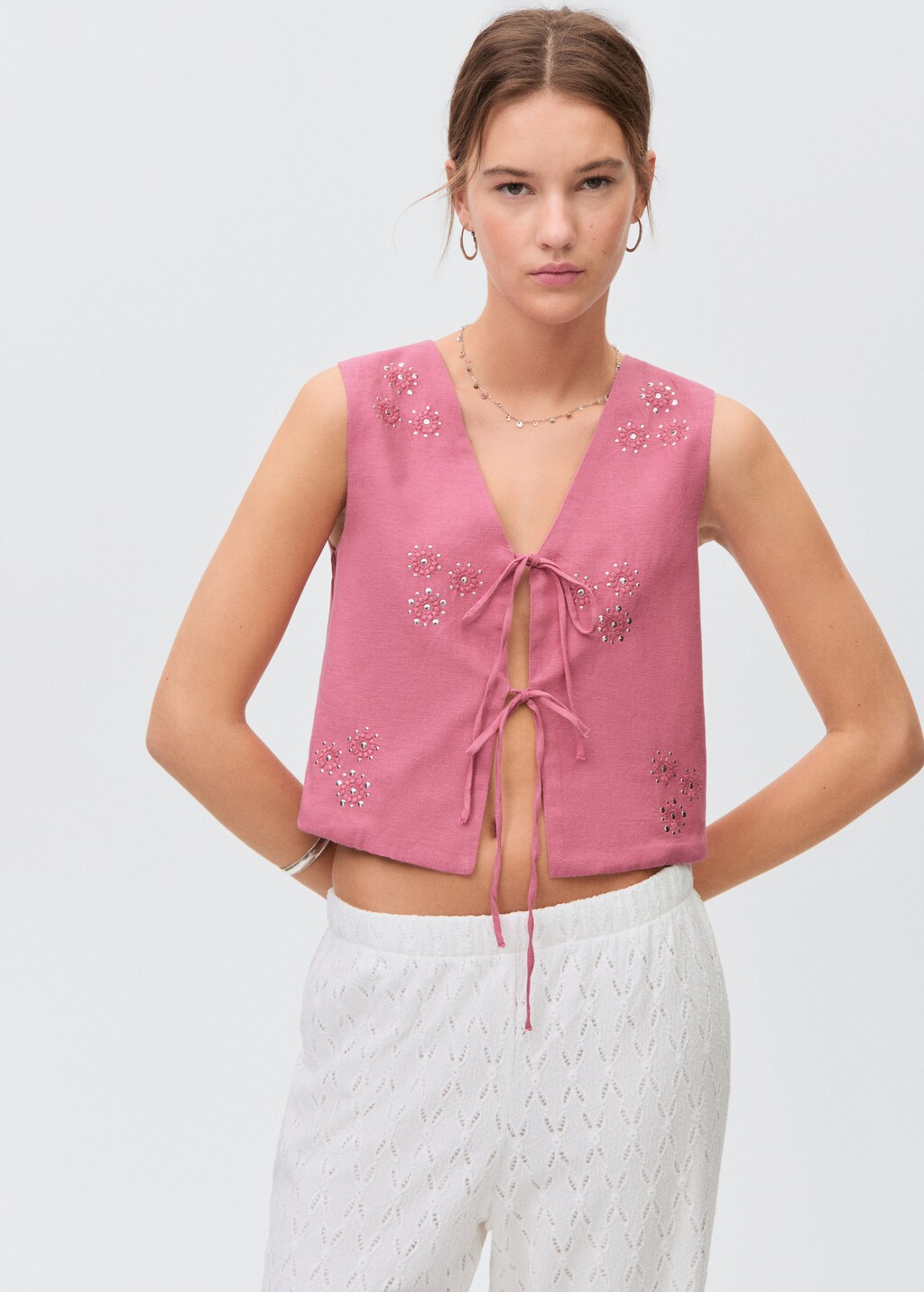 Embroidered vest with bows