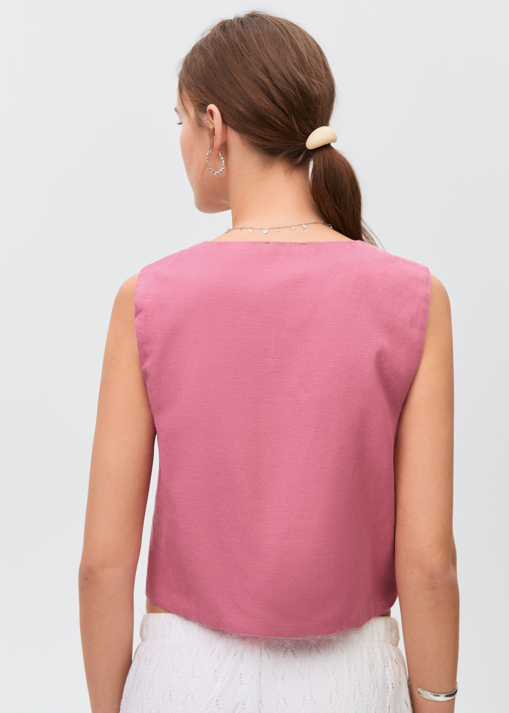 Embroidered waistcoat with bows - Reverse of the article
