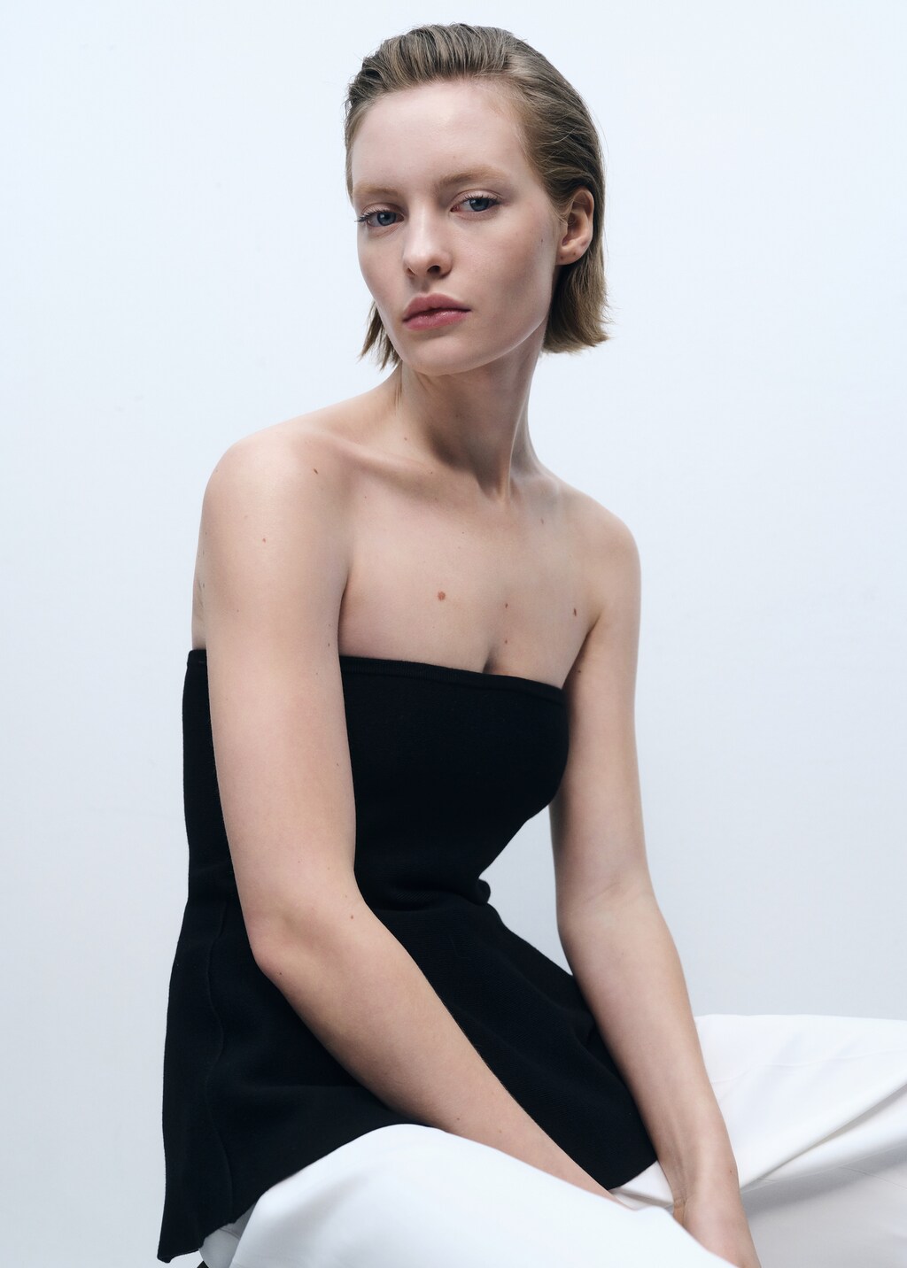 Top maglia sottile peplum - Donna | MANGO Italia Top maglia sottile peplum - Donna | MANGO Italia