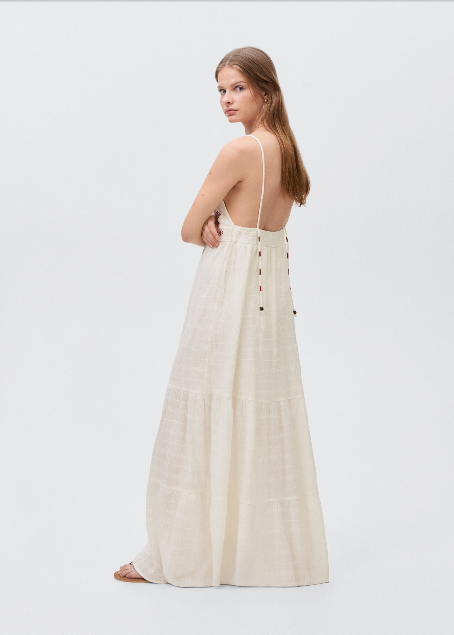 Embroidered dress with suns - Reverse of the article