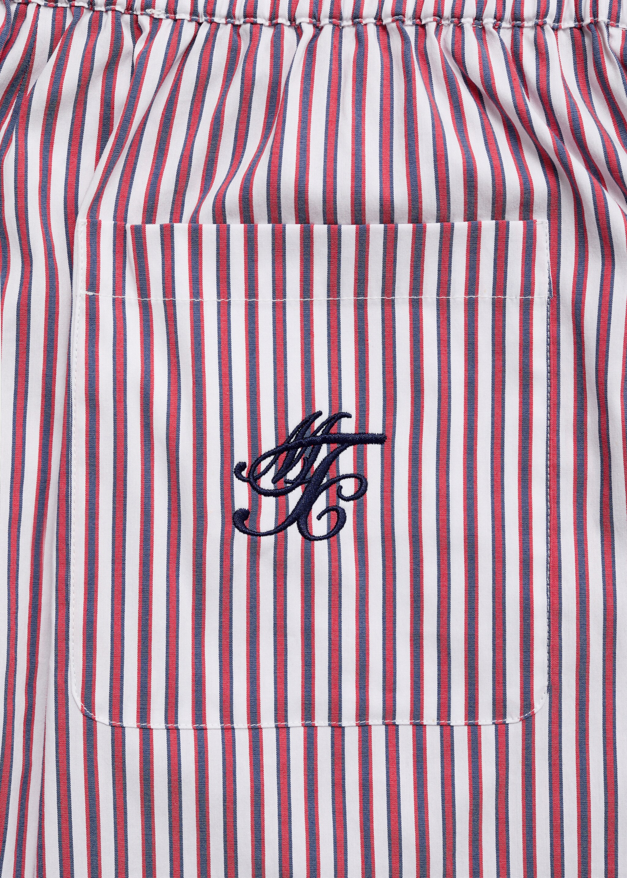 Striped poplin shorts with embroidered message - Details of the article 0