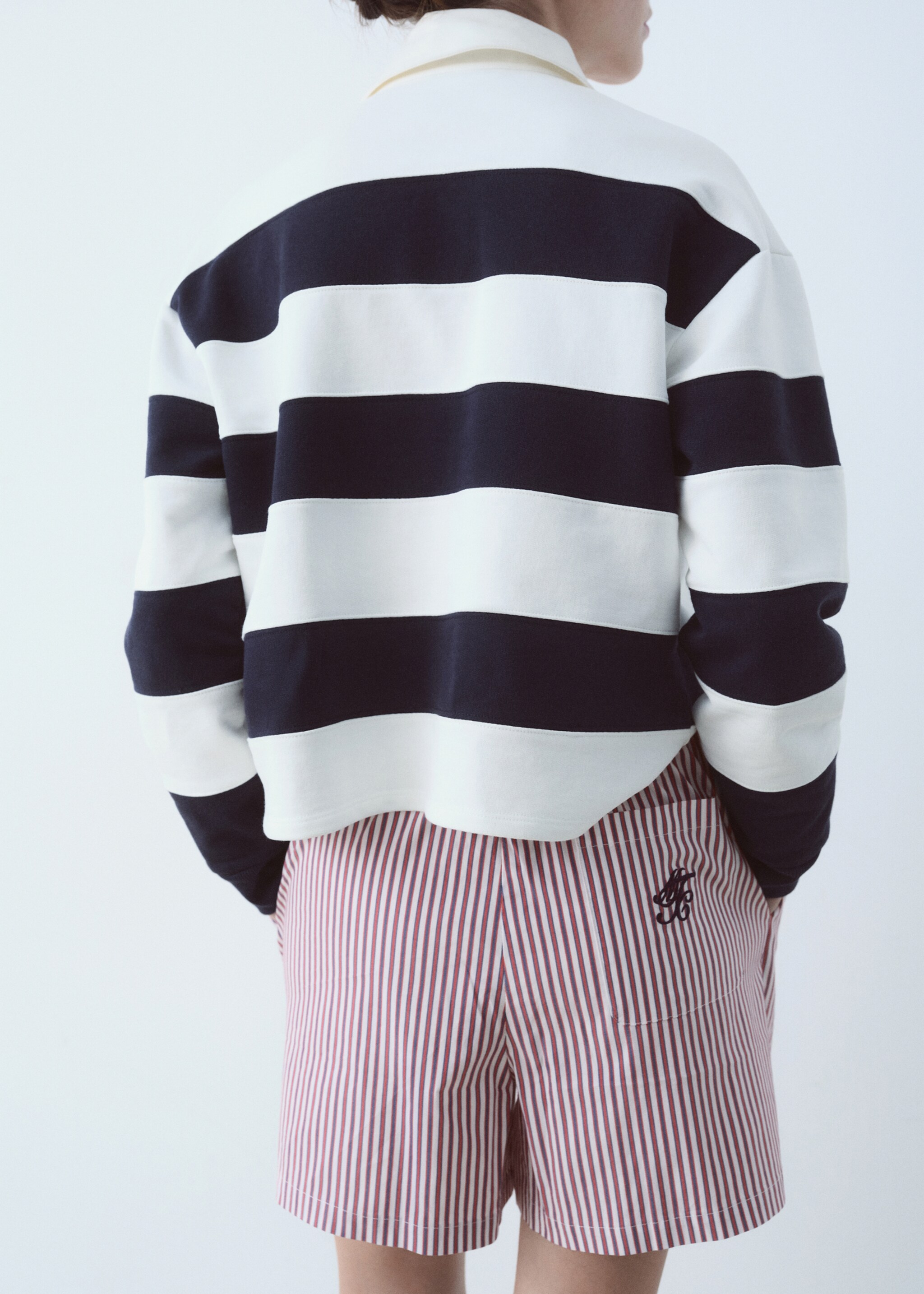 Striped poplin shorts with embroidered message - Reverse of the article