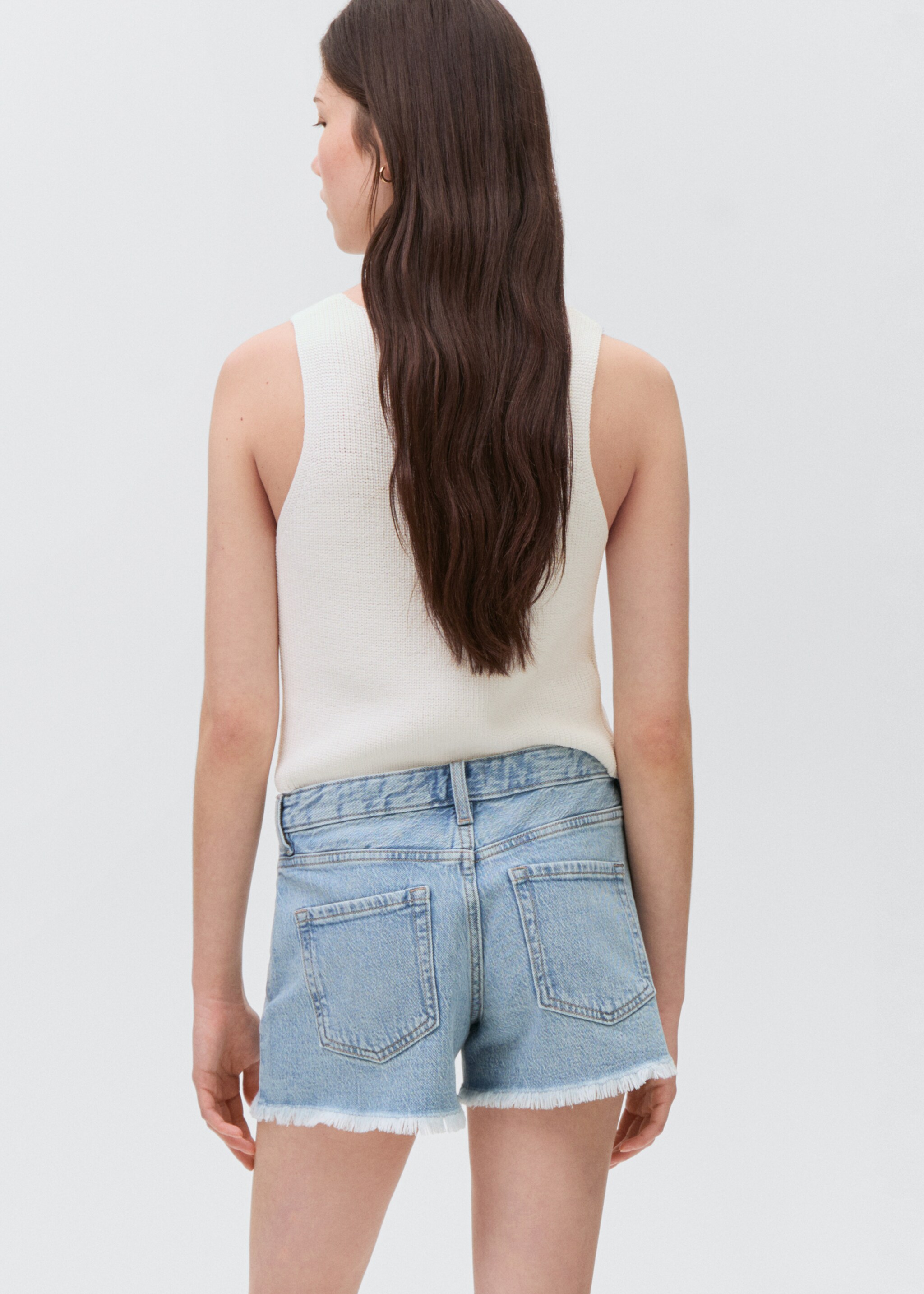 Low-waist shorts with rhinestones - Reverse of the article