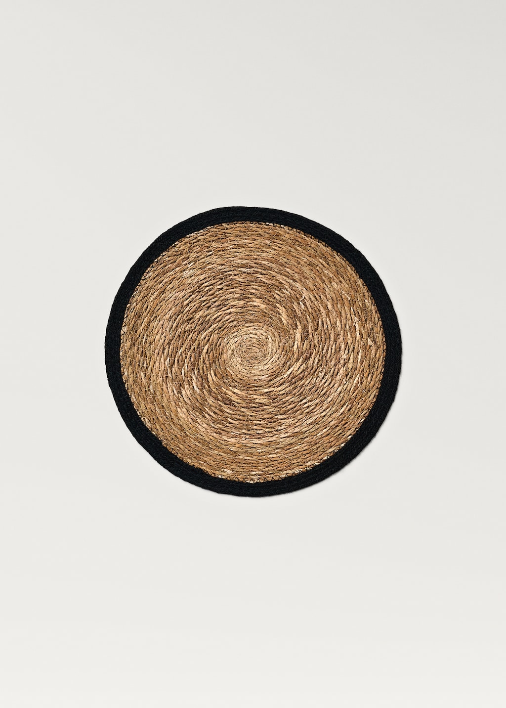 Natural fiber braided placemat