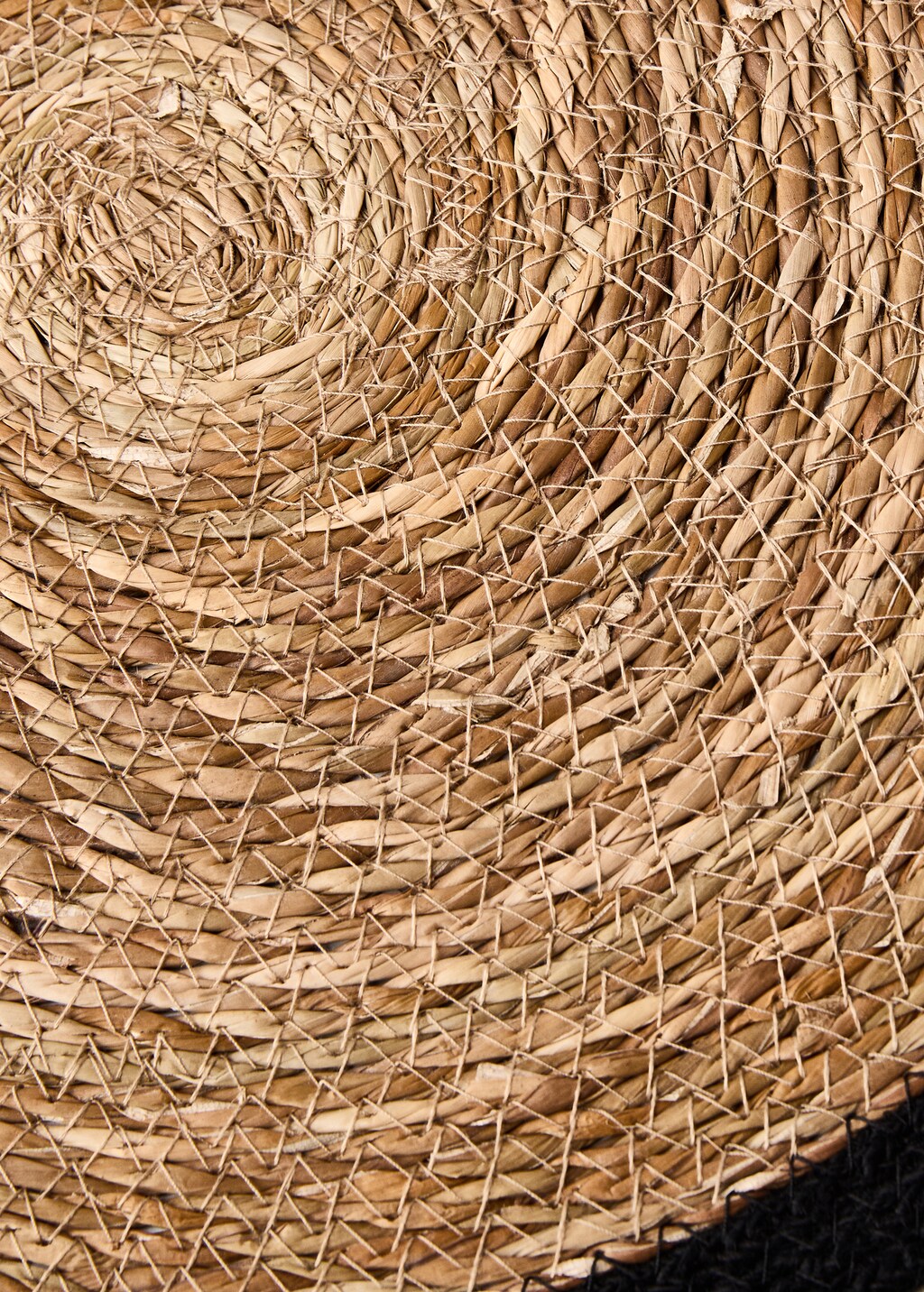 Natural fiber braided placemat