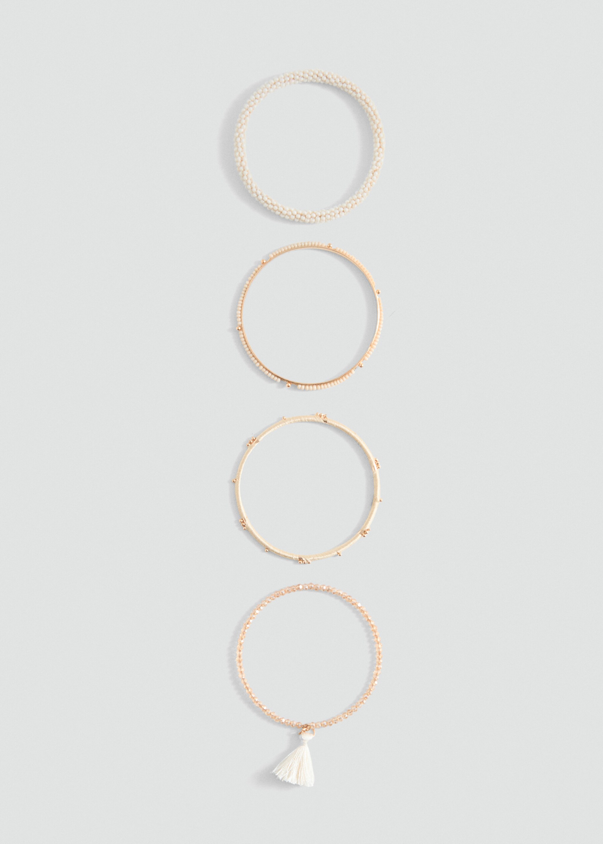 Pack pulseras borlas - Artículo sin modelo