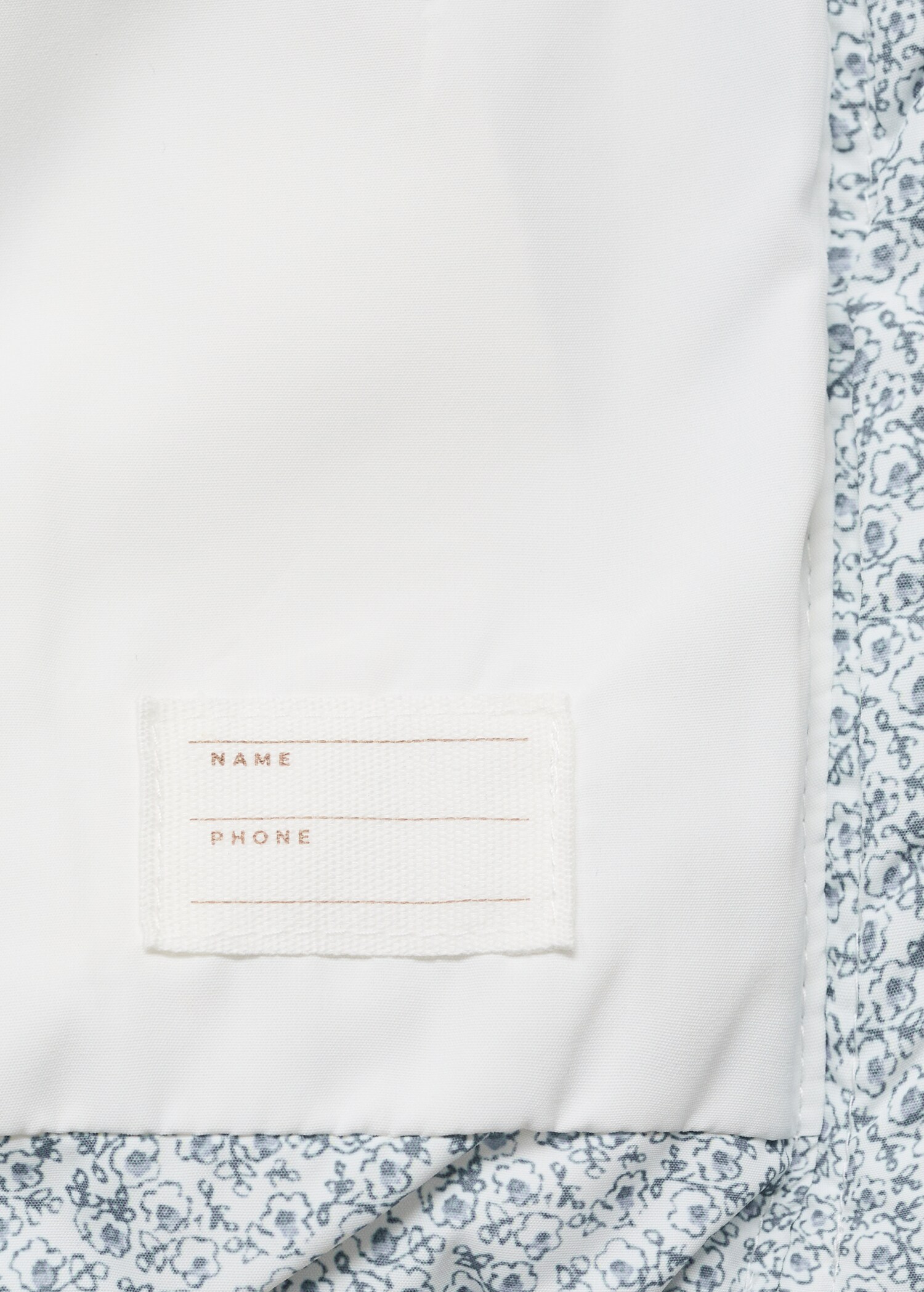Printed quilted gilet - Details of the article 0