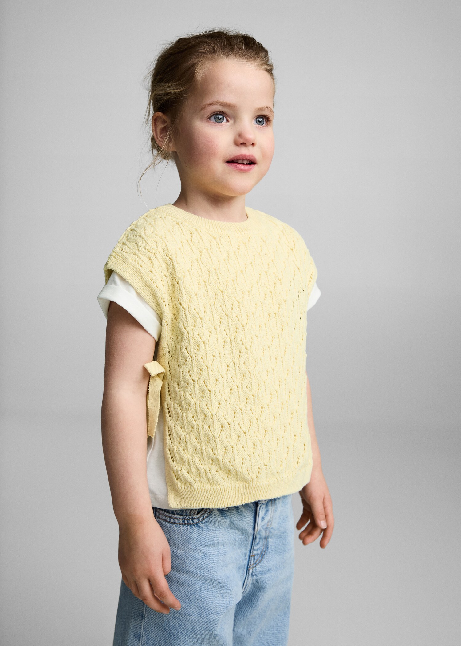 Knitted gilet with openwork details - Medium plane