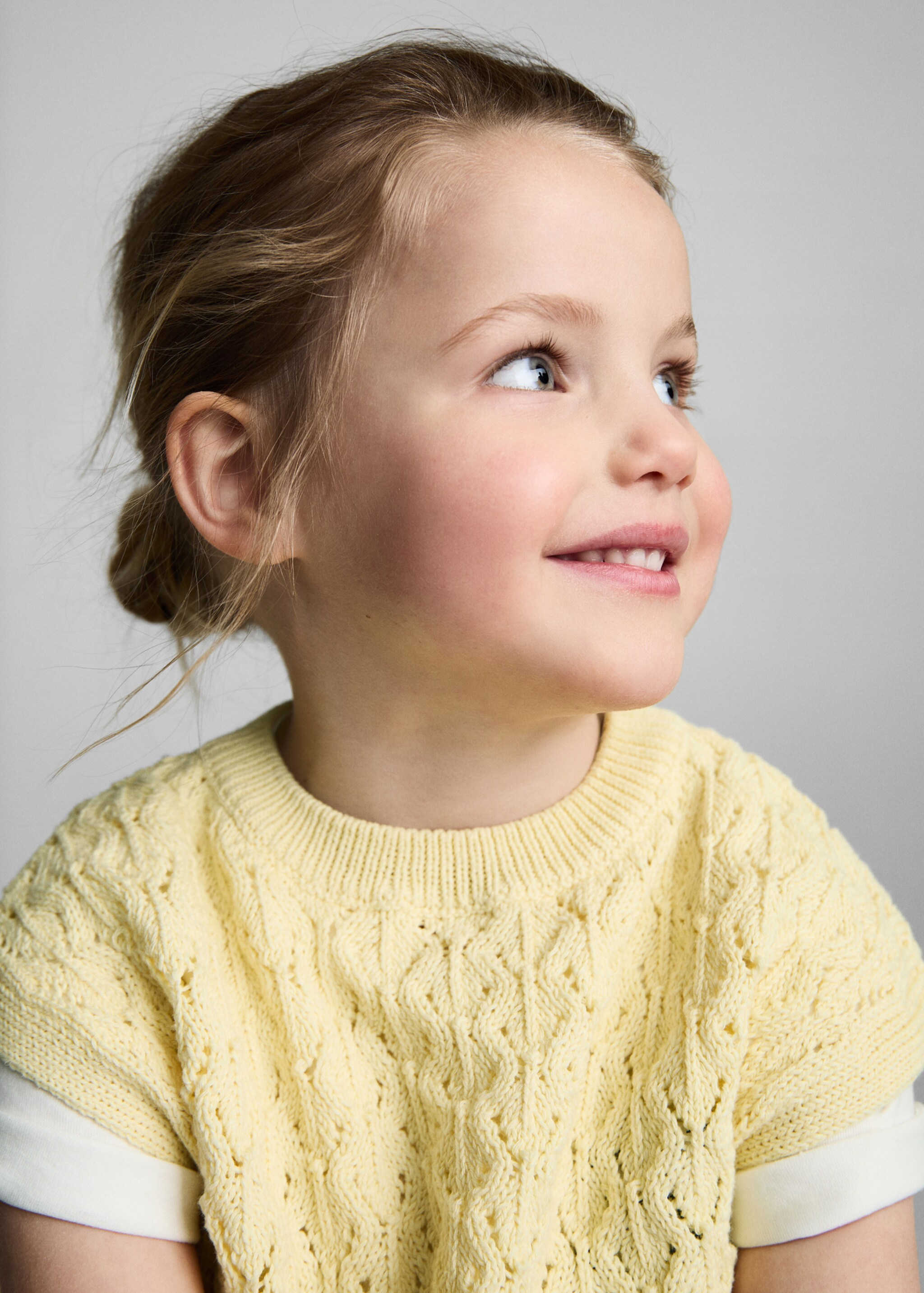 Knitted gilet with openwork details - Details of the article 1