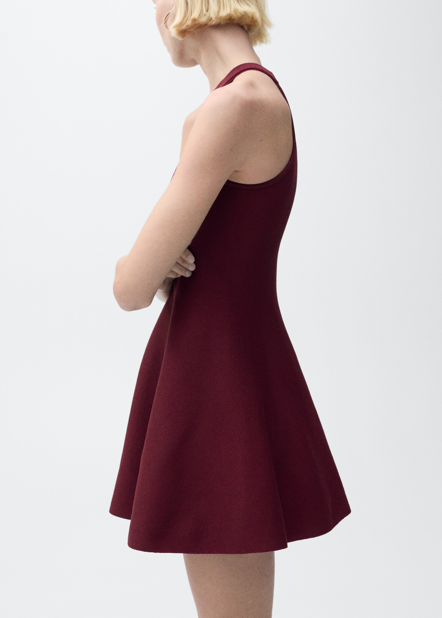 Krátké šaty z úpletu peplum - Detail zboží 1