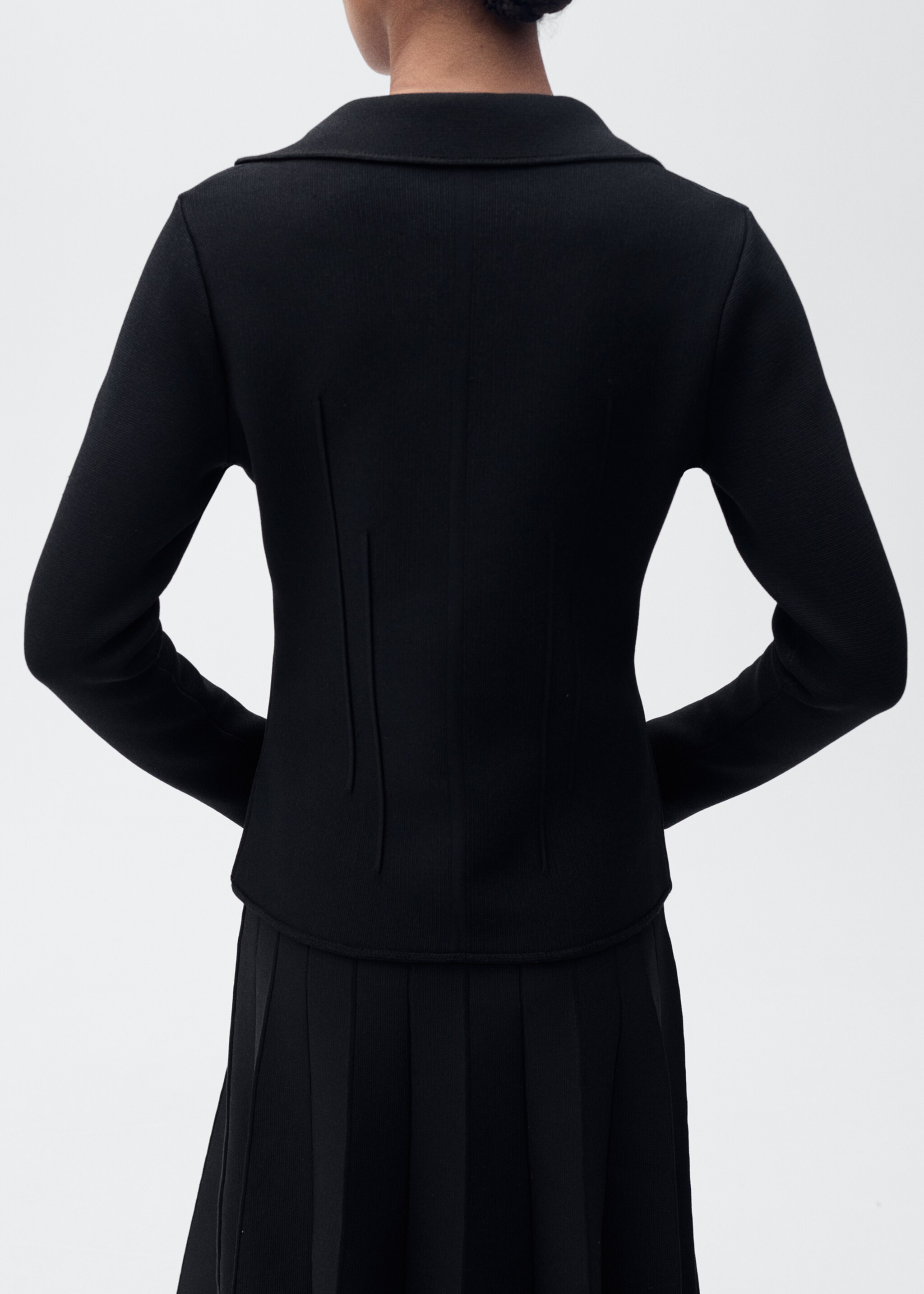 Knitted jacket with lapel collar - Reverse of the article