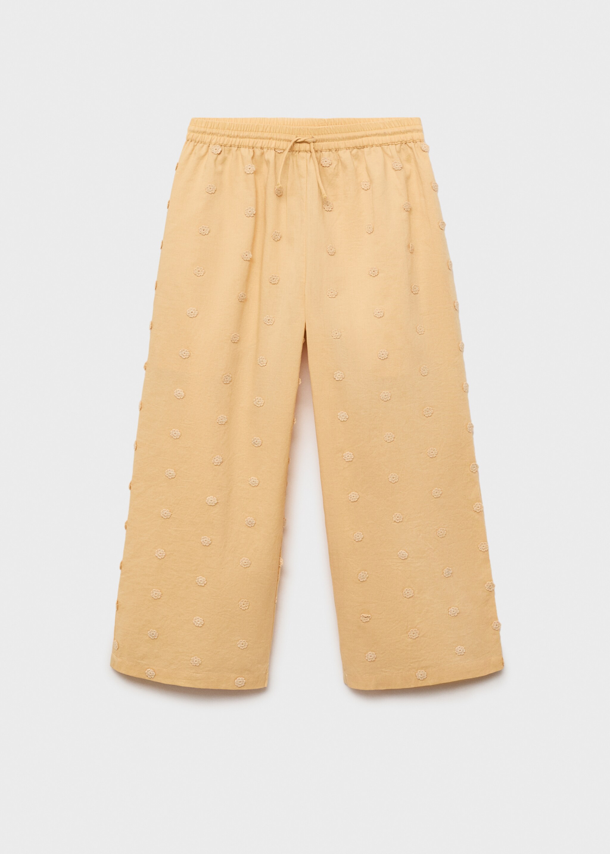 Long trousers with embroidered details - Article without model